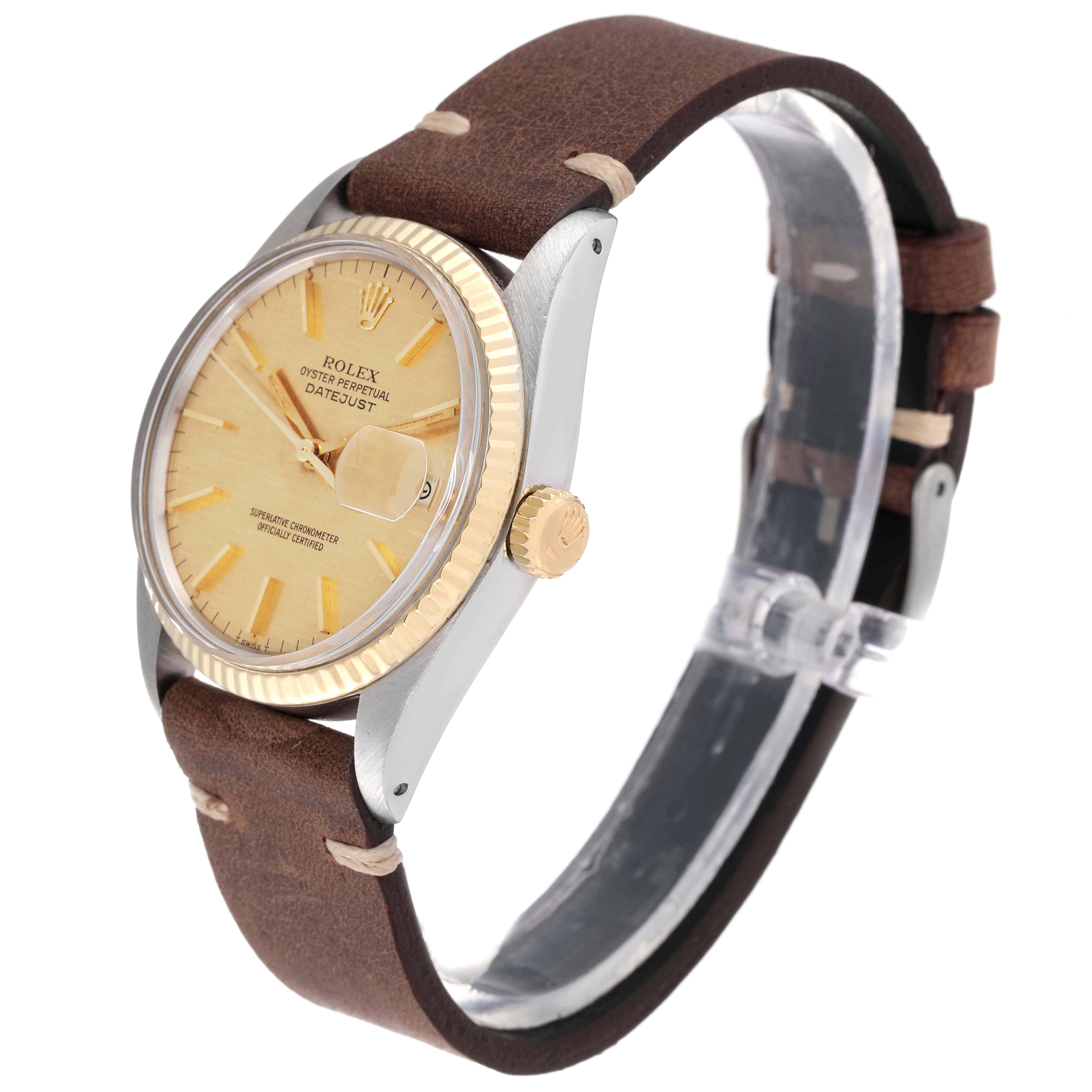 The Vintage Collection Rolex watch is shown at a three-quarter angle, displaying the face, bezel, crown, and brown leather strap.