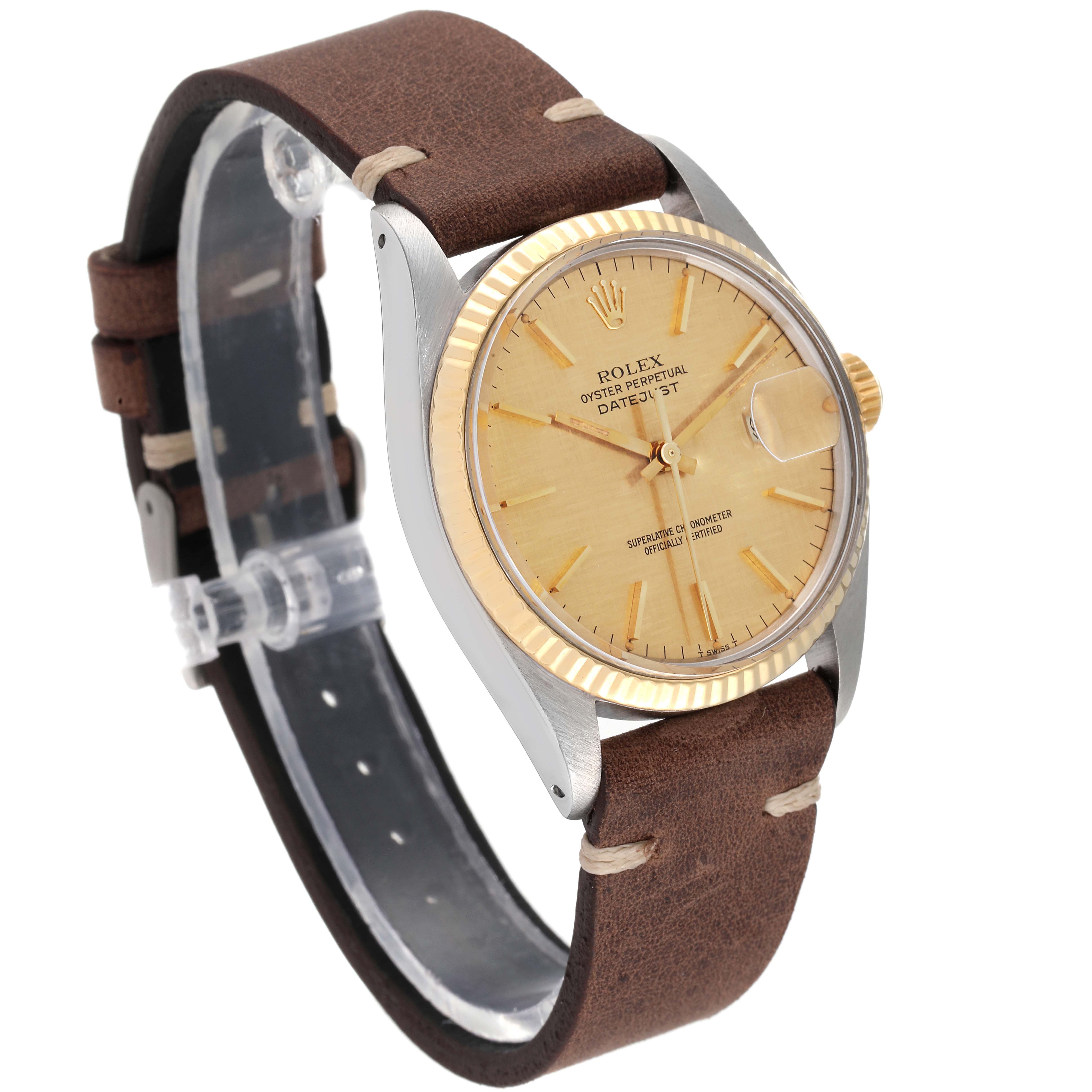 This image shows a side angle of the Vintage Collection Rolex Oyster Perpetual Datejust watch, highlighting the brown leather strap and gold bezel.