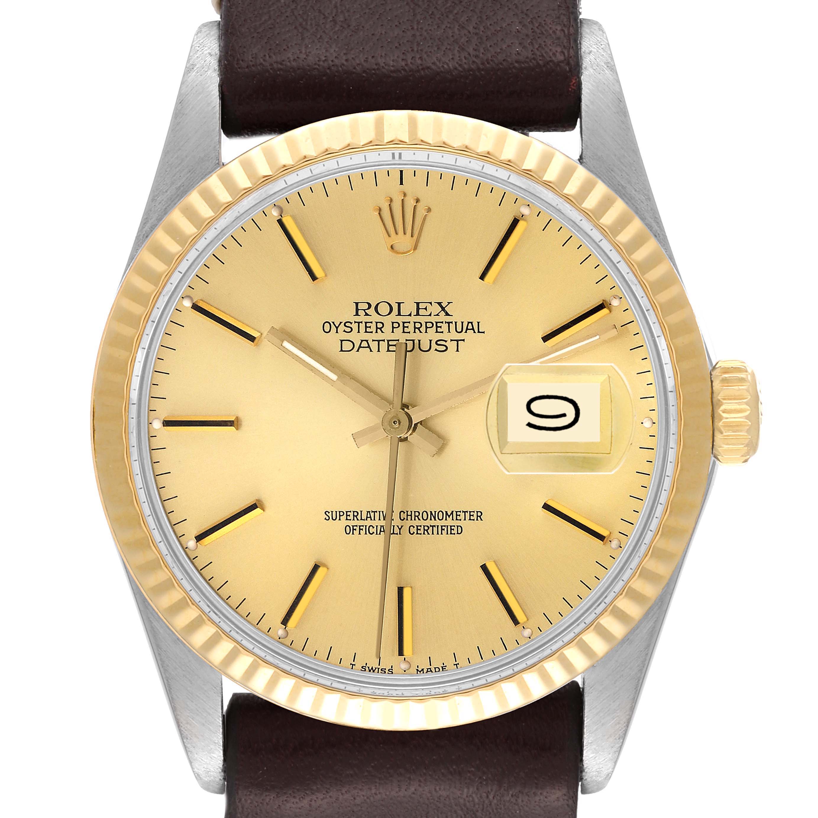 The image shows the face of a Rolex Vintage Collection 16013 Men's Steel and Gold (two tone) Champagne Dial 16013 Men's Steel and Gold (two tone) Champagne Dial watch, featuring a golden dial, date window, fluted bezel, and dark leather strap.
