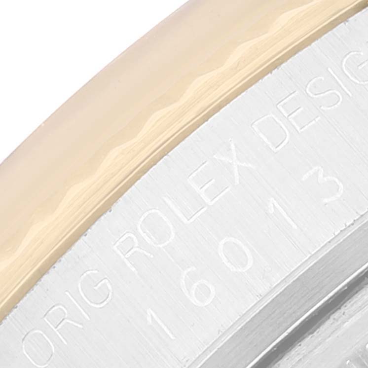 This close-up image shows the side engraving on a Rolex Vintage Collection 16013 Men's Steel and Gold (two tone) Champagne Dial 16013 Men's Steel and Gold (two tone) Champagne Dial watch model 16013.