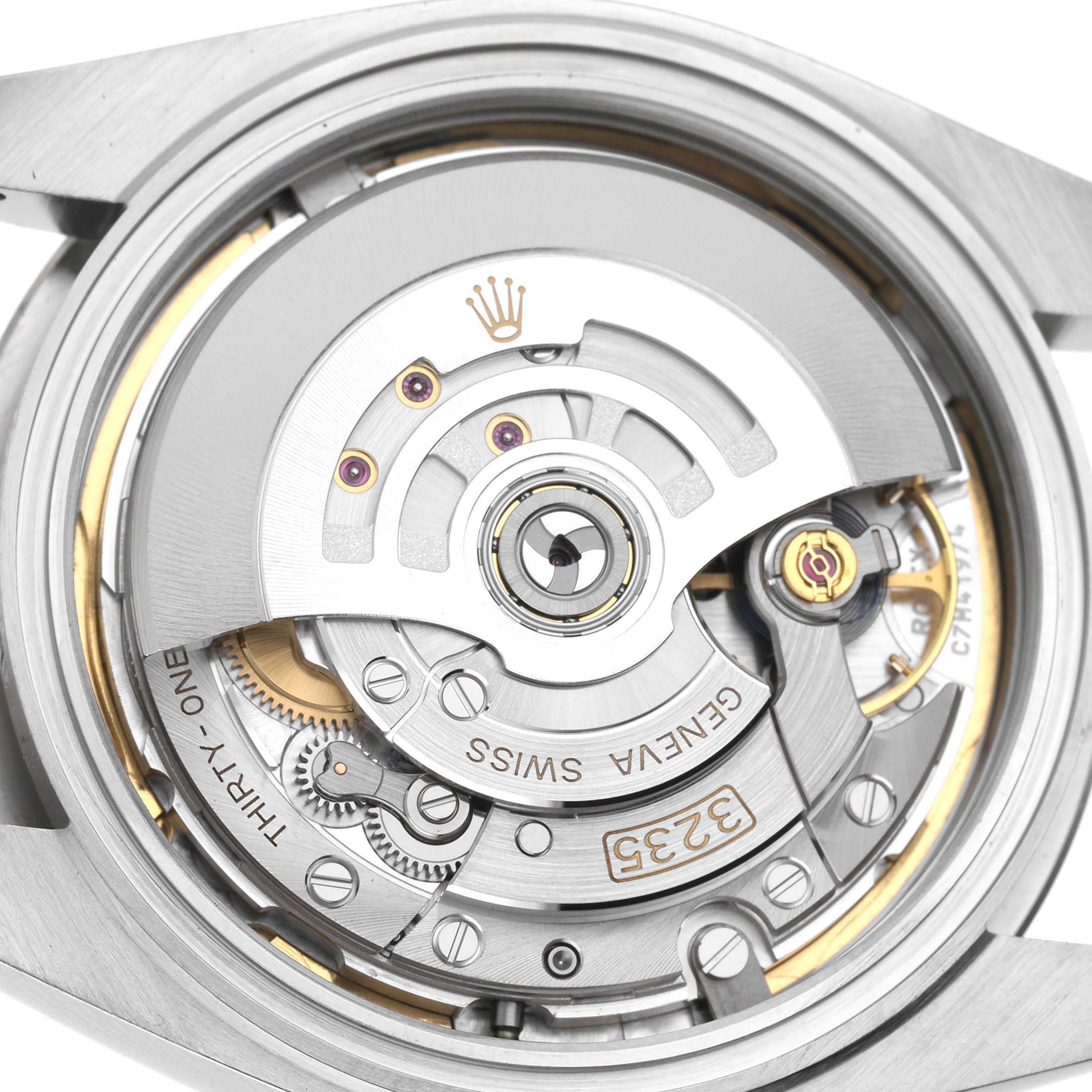 The image shows the movement of the Rolex Datejust 41 126334 Men's Stainless Steel Blue Dial, highlighting its intricate internal mechanism from the back.