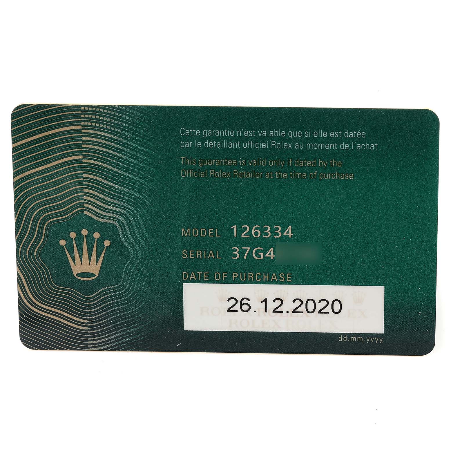 This image shows the warranty card for a Rolex Datejust 41 126334 Men's Stainless Steel Grey Dial 126334 Men's Stainless Steel Grey Dial model 126334, including the serial number and date of purchase.