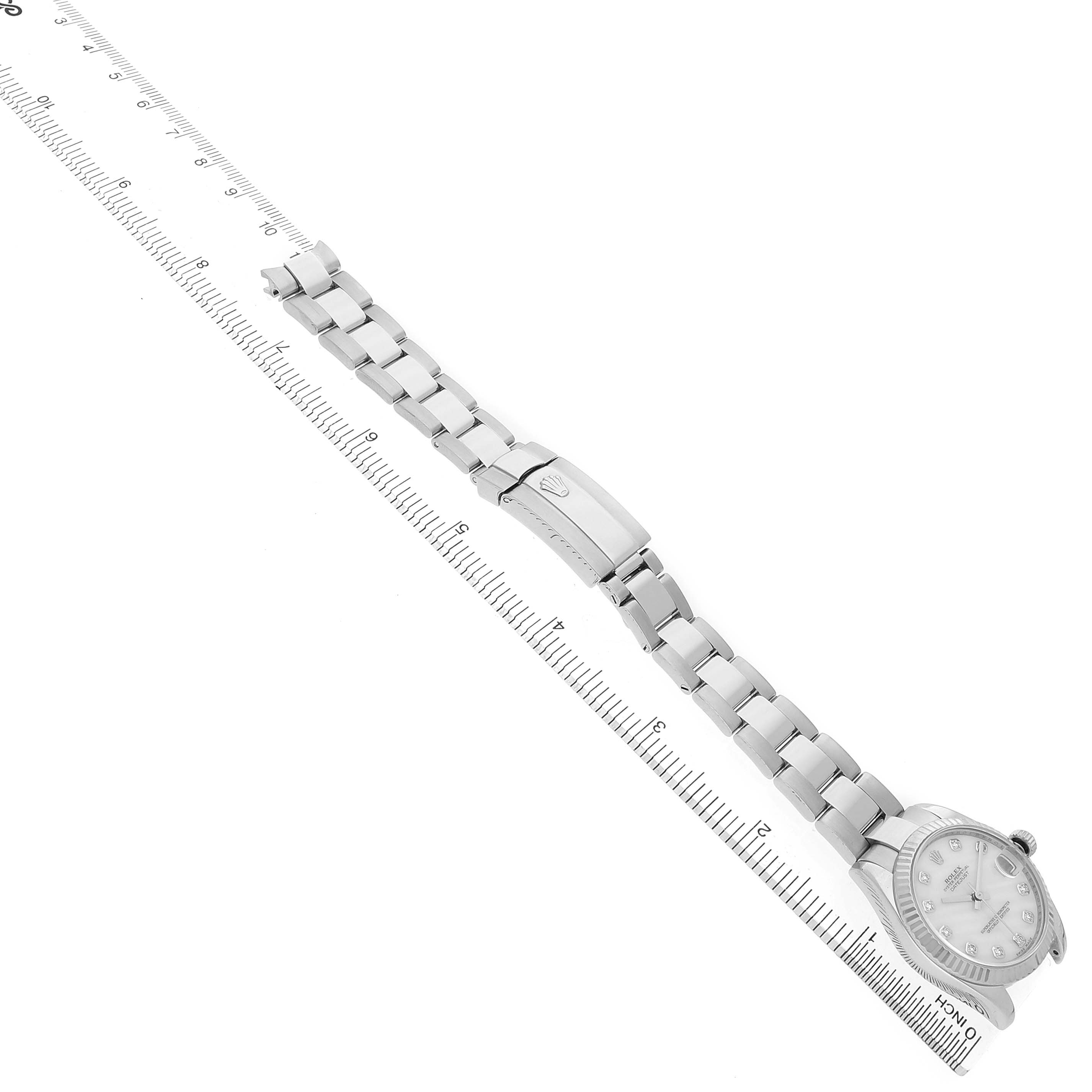 The Rolex Mid-Size 178274 Women's Stainless Steel Mother of Pearl Dial watch is shown laid flat, displaying the full bracelet with the clasp and part of the dial visible.