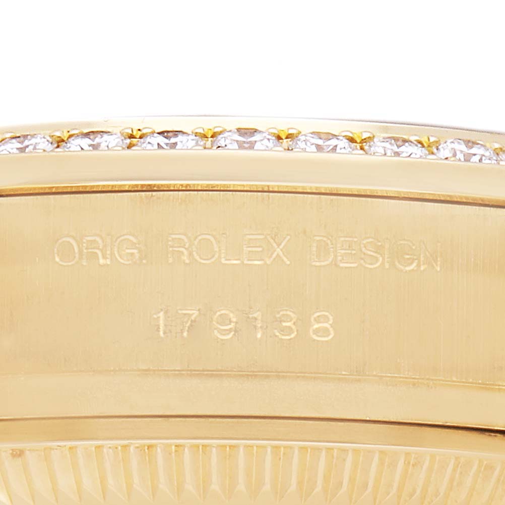 The image shows a close-up of the side of a Rolex President model, model number 179138, focusing on the bezel with gemstone accents and engraved text.