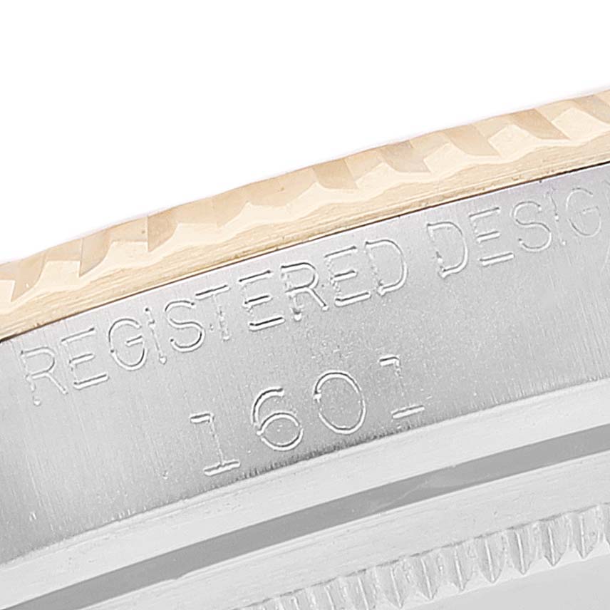 The image shows a close-up of the model number and bezel of the Rolex Vintage Collection 1601 Men's Steel and Gold (two tone) Silver Dial 1601 Men's Steel and Gold (two tone) Silver Dial watch model 1601.