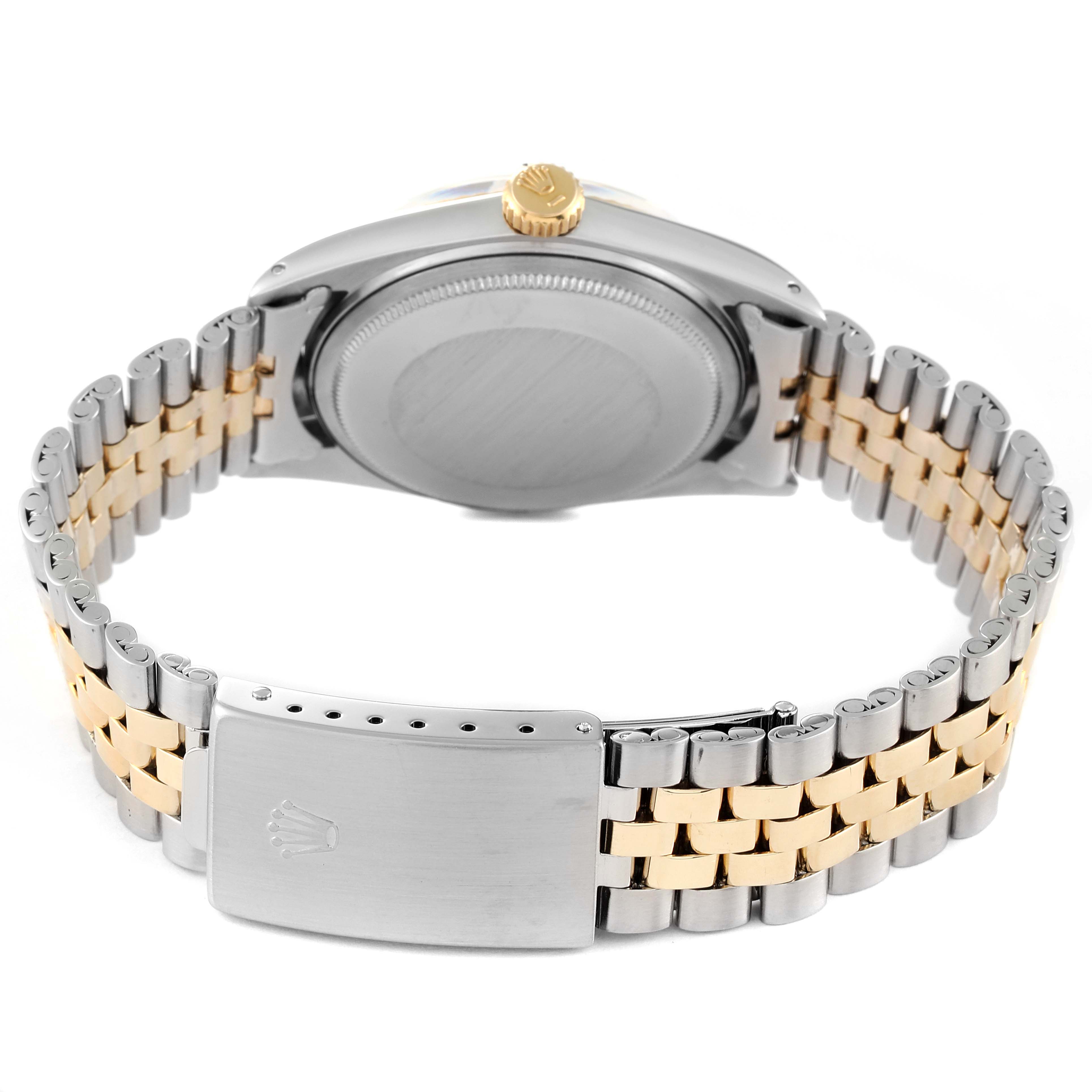 The image depicts the back view of a Rolex Vintage Collection 1601 Men's Steel and Gold (two tone) Silver Dial 1601 Men's Steel and Gold (two tone) Silver Dial watch, showing its case, crown, and two-tone bracelet with a clasp.