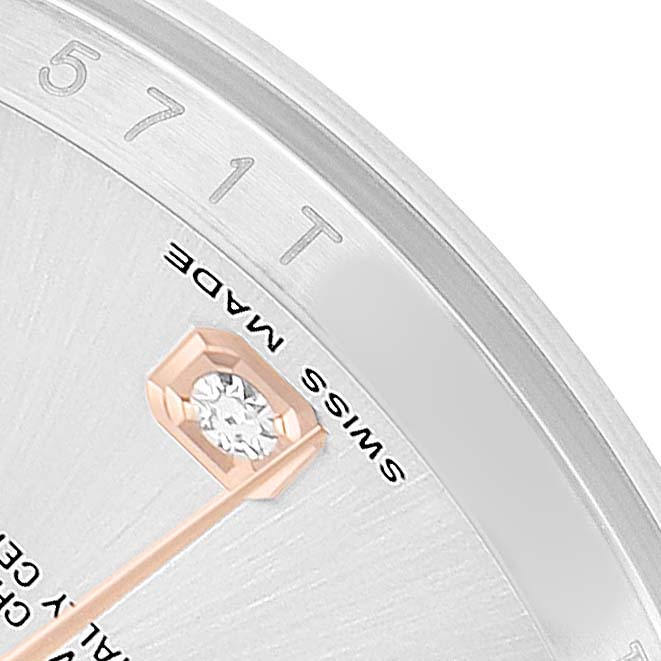 The image shows a close-up of the Rolex Datejust 116201 Men's Steel and Gold (two tone) Silver Dial dial, highlighting the diamond marker, "Swiss Made" text, and part of the bezel.