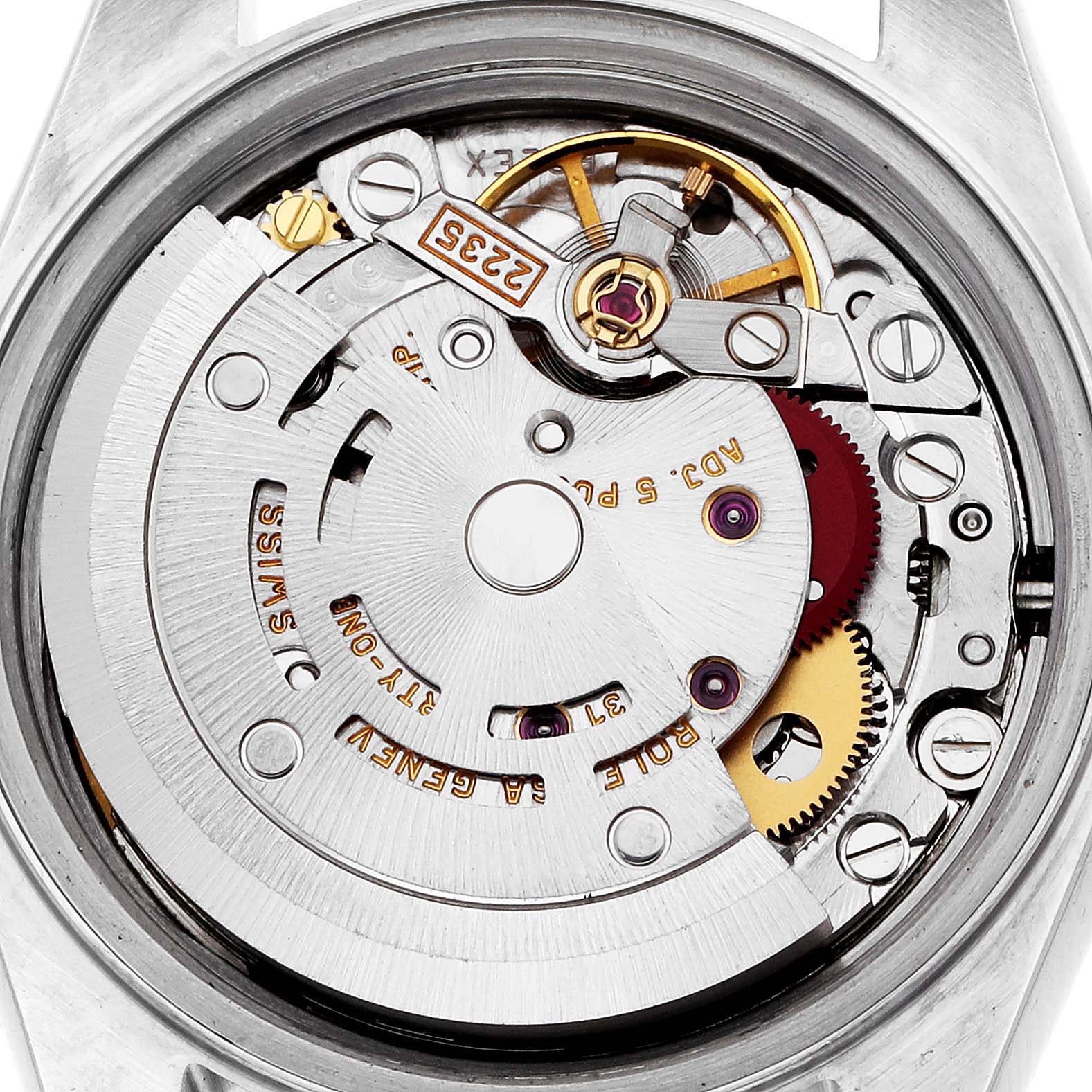 The image shows the movement of a Rolex Datejust (model 79174) from a top-down angle, highlighting components like the rotor and gears.