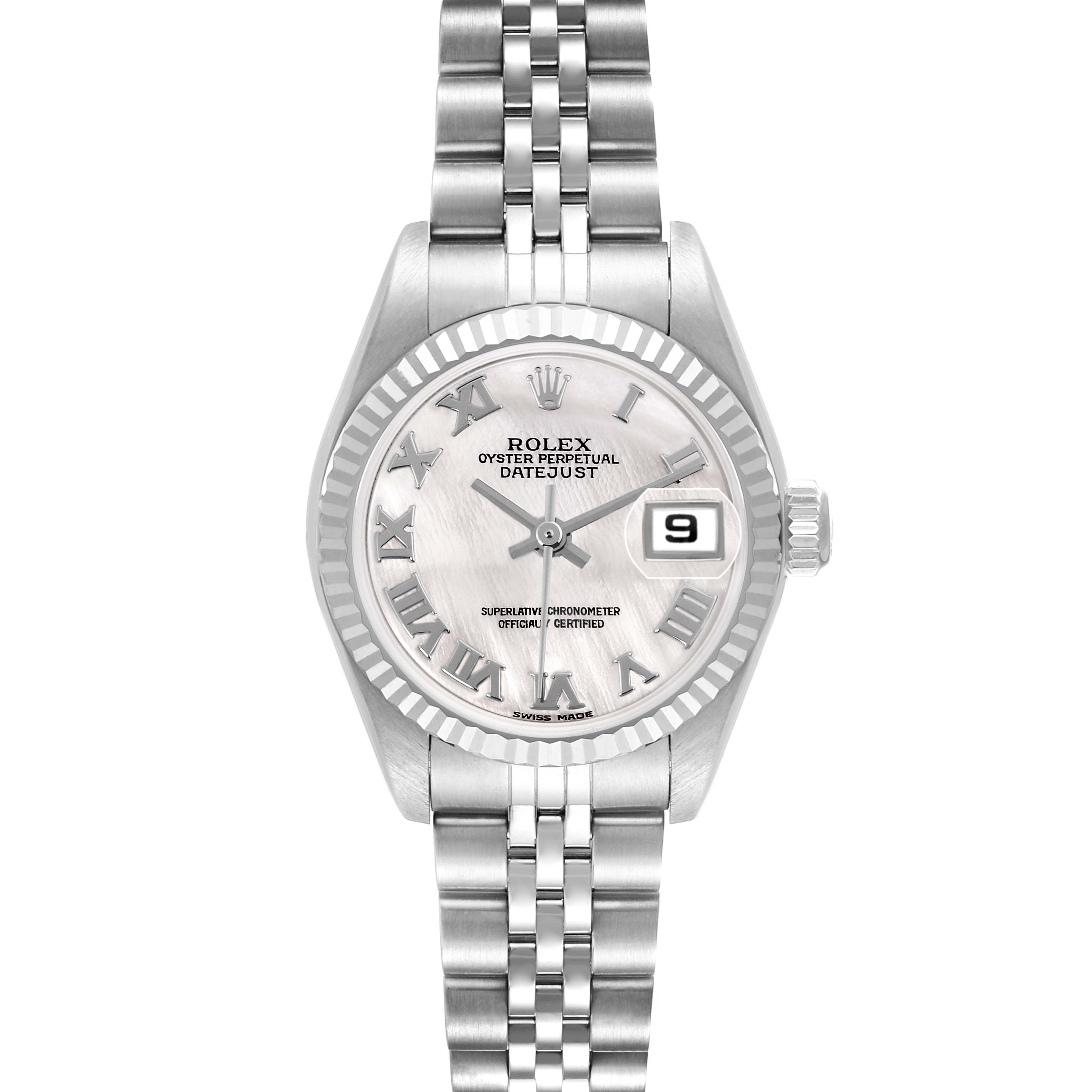 The image shows a Rolex Datejust model 79174 men's watch from a front angle, highlighting the face, bezel, bracelet, and date window.
