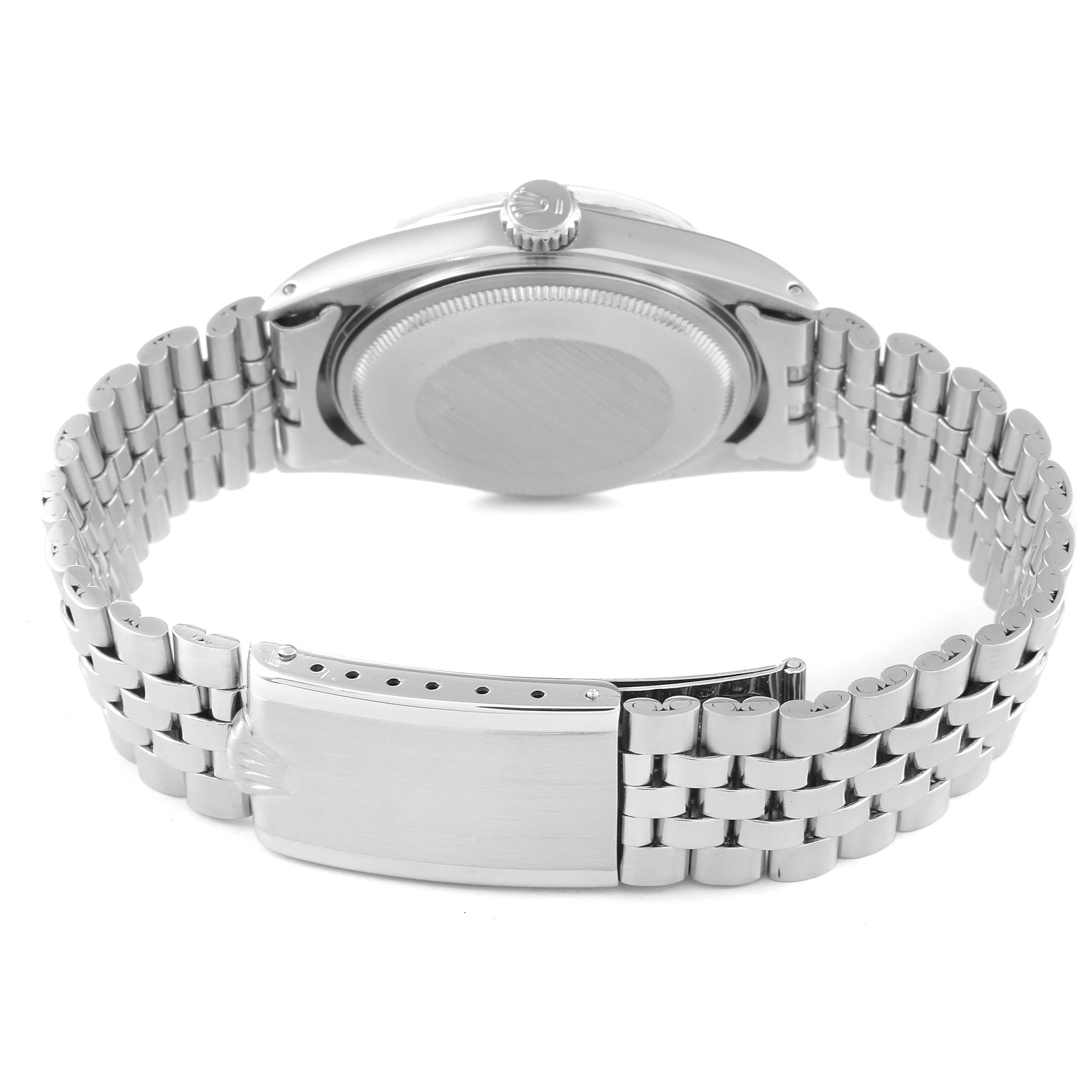 The image shows the back view of a Rolex Vintage Collection 1601 Men
s Stainless Steel Silver Dial 1601 Men
s Stainless Steel Silver Dial watch, focusing on the case back, crown, and bracelet.