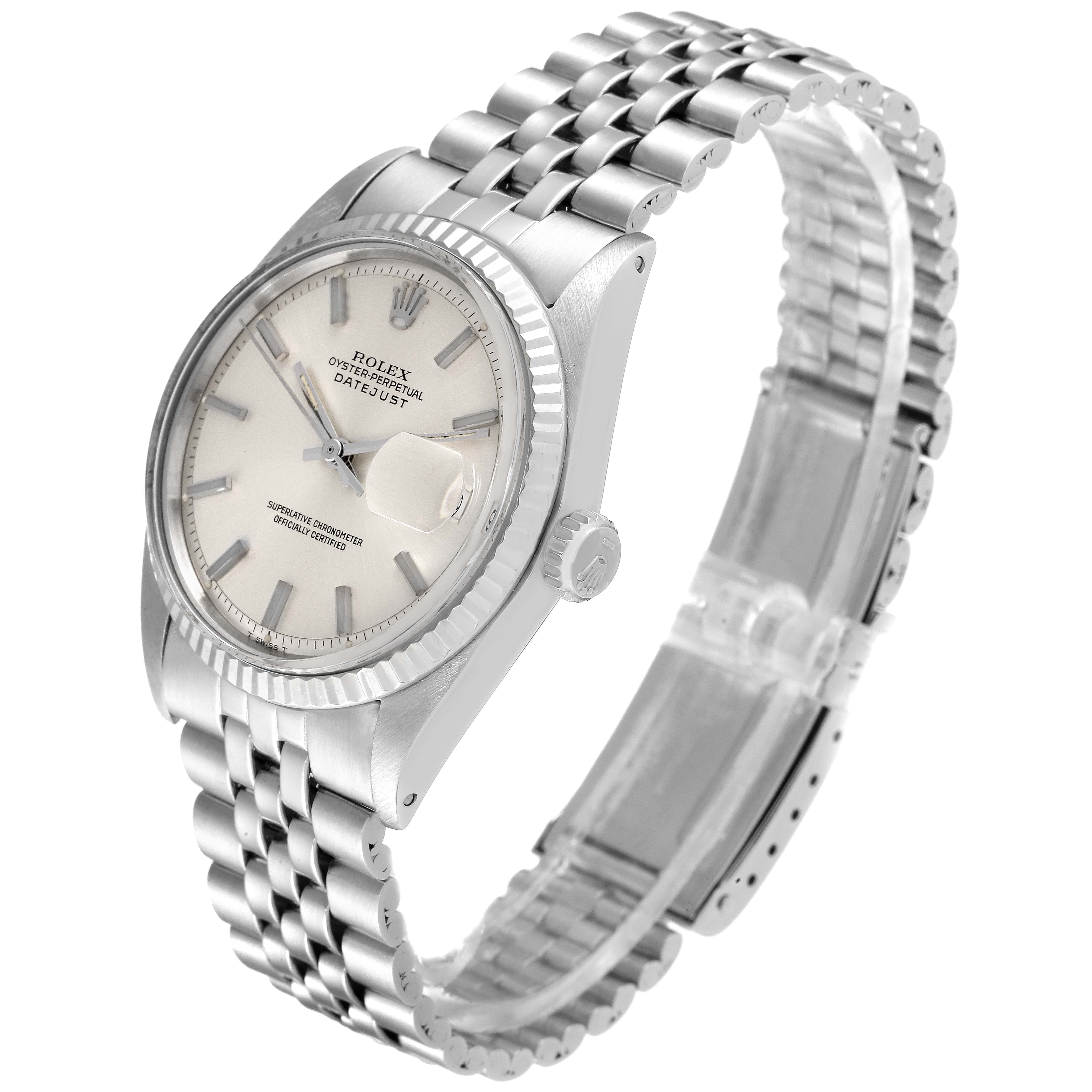 The image shows a side view of the Rolex Vintage Collection 1601 Men
s Stainless Steel Silver Dial 1601 Men
s Stainless Steel Silver Dial watch, highlighting its dial, bezel, and bracelet.