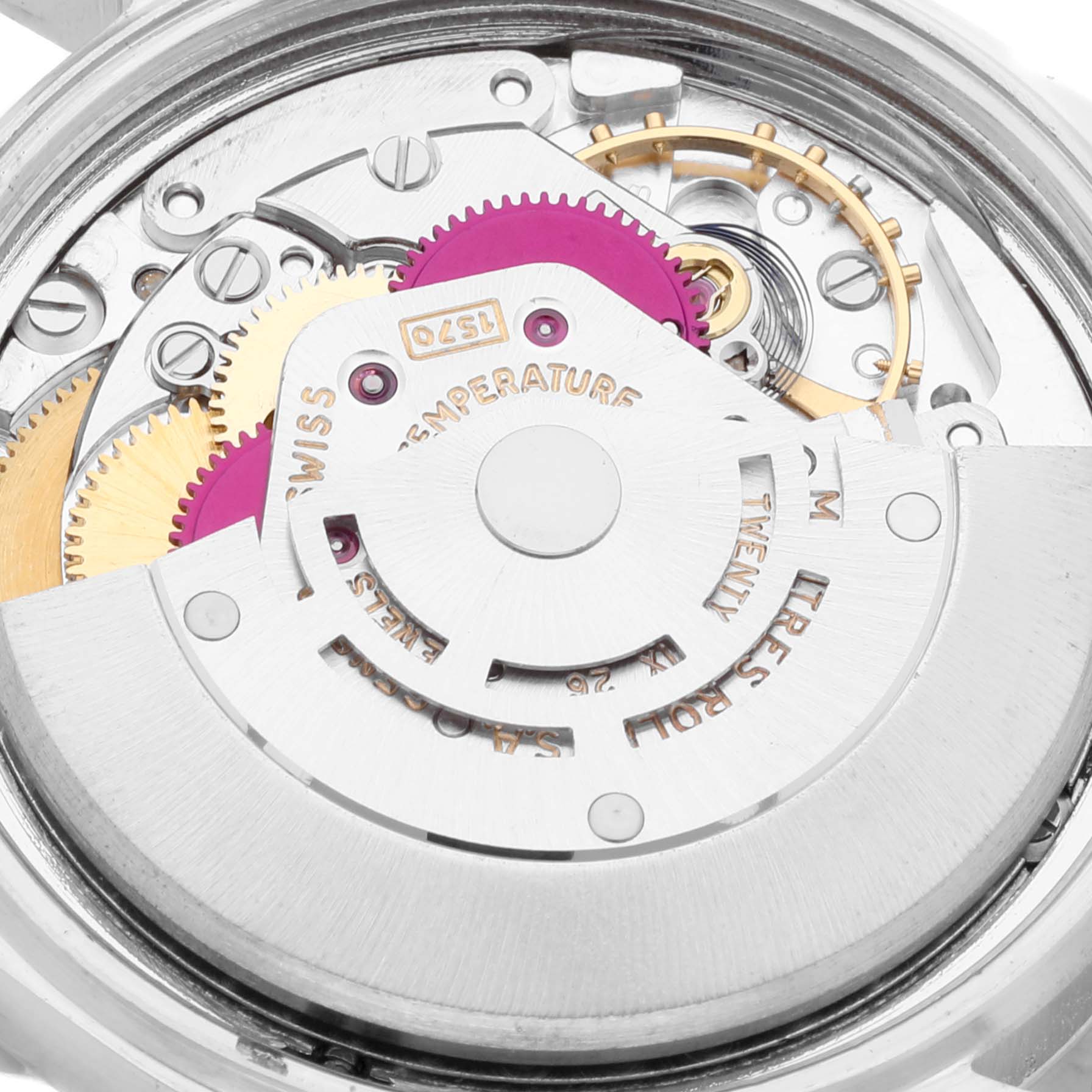 The image shows a close-up of the movement and inner mechanisms of a Rolex Datejust 1601 Men's Stainless Steel Silver Dial 1601 Men's Stainless Steel Silver Dial watch.