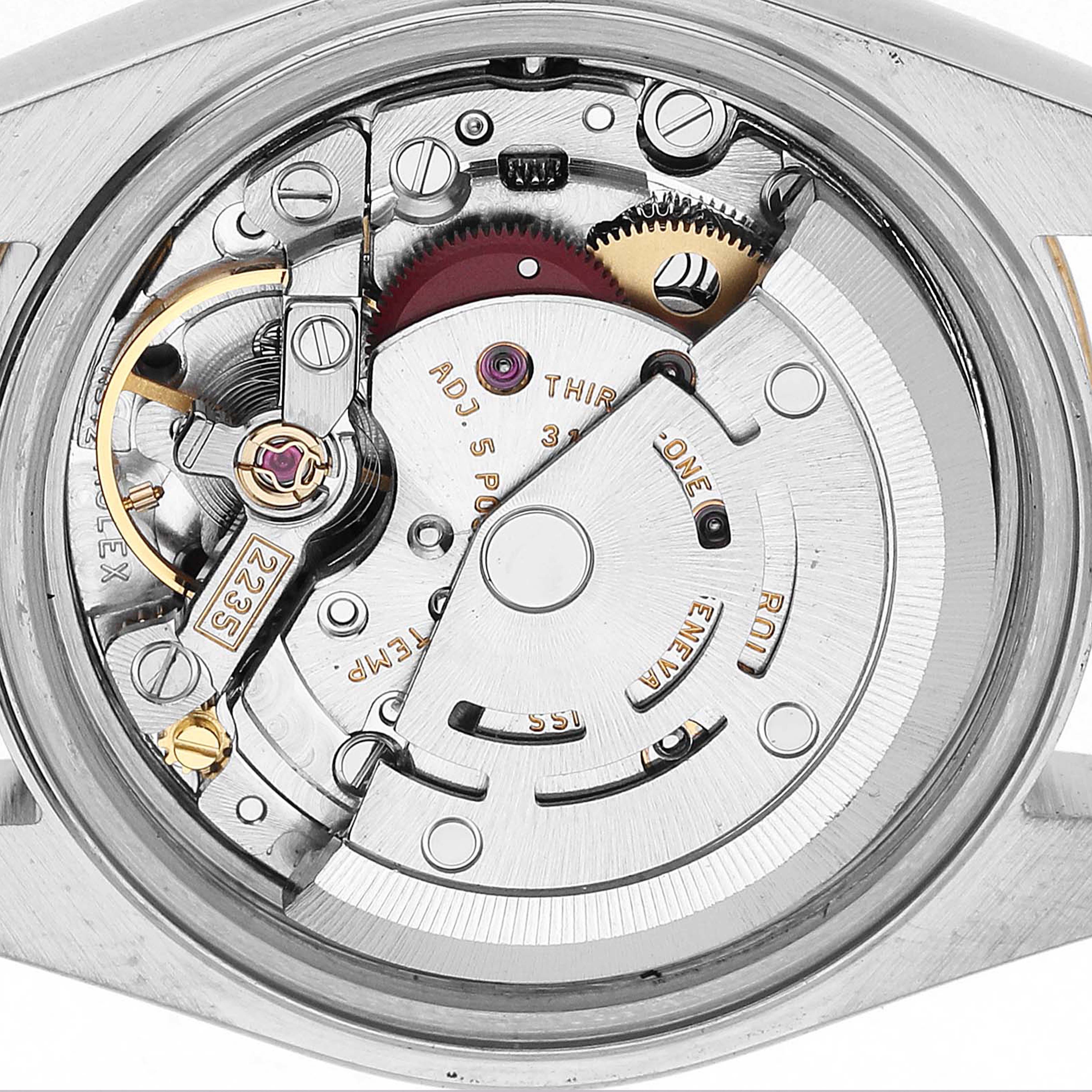 The image shows the Rolex Datejust 79173 Women's Steel and Gold (two tone) Blue Dial watch movement's intricate internal mechanics from a straight-on angle.