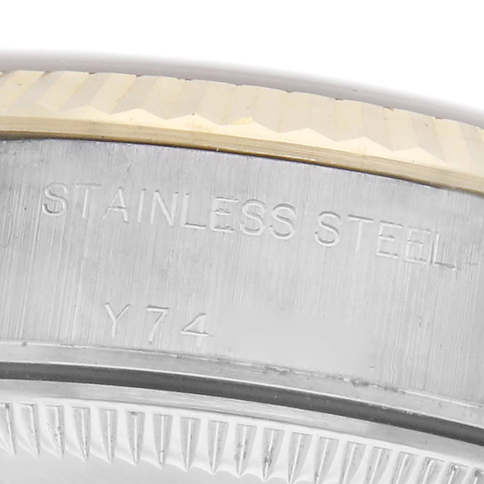 The image shows a close-up angle of the watch's casing for the Rolex Datejust model 79173, highlighting the "Stainless Steel" engraving.
