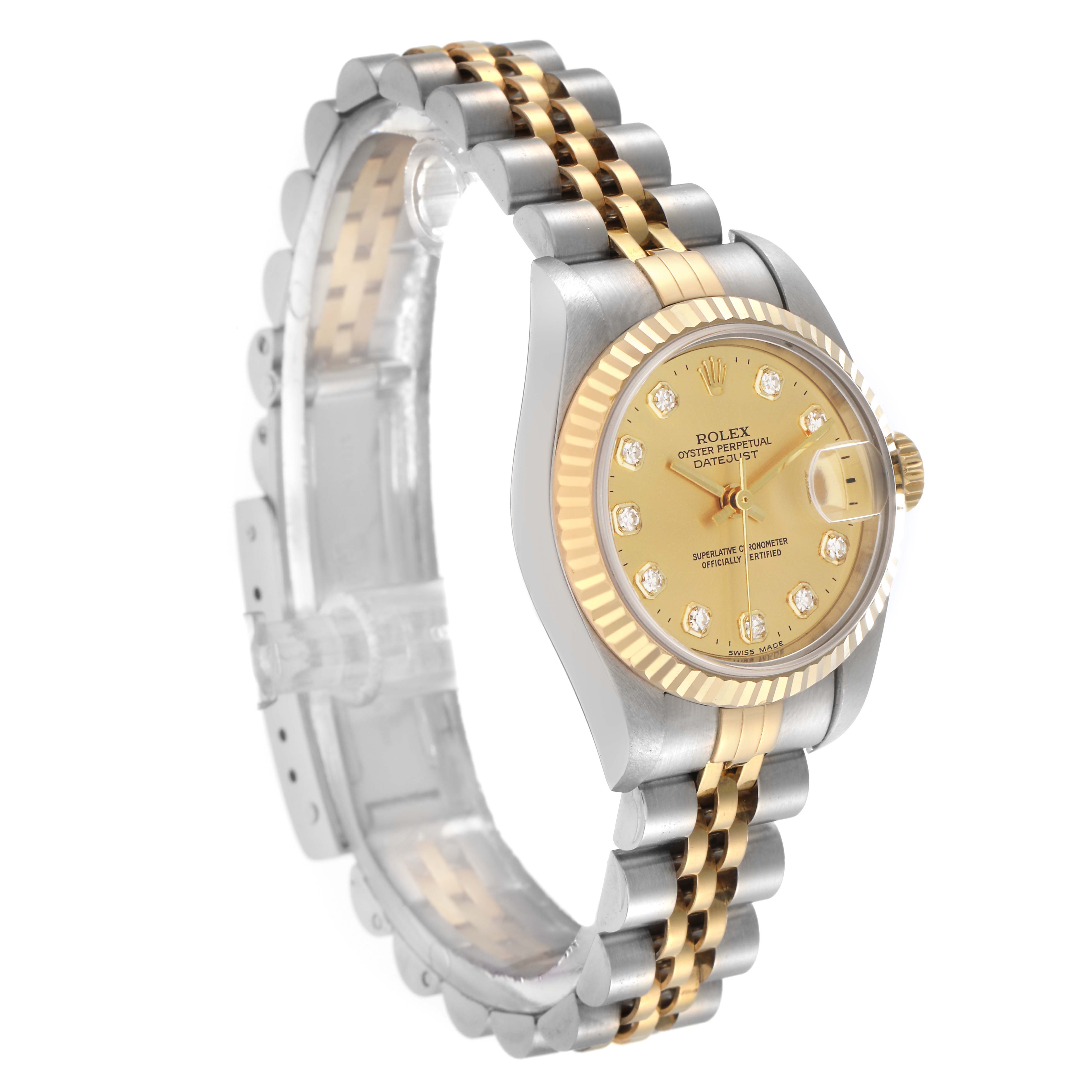 The Rolex Datejust model 79173 is shown at a slight angle, displaying the gold and silver bracelet, gold dial with diamond markers, and fluted bezel.