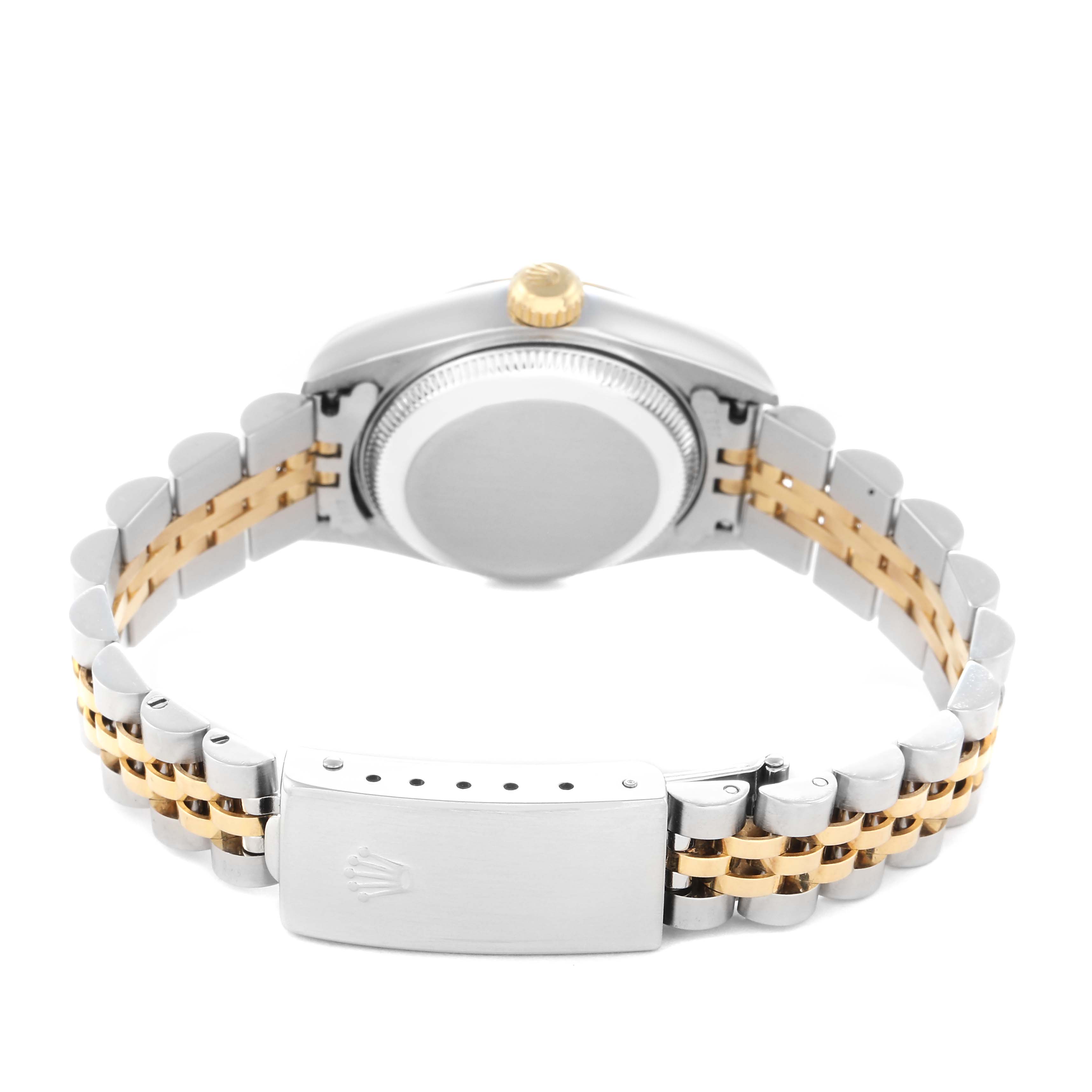 The image shows the back view of a Rolex Datejust Model 79173 men's watch, highlighting the case back, crown, and the two-tone bracelet clasp.