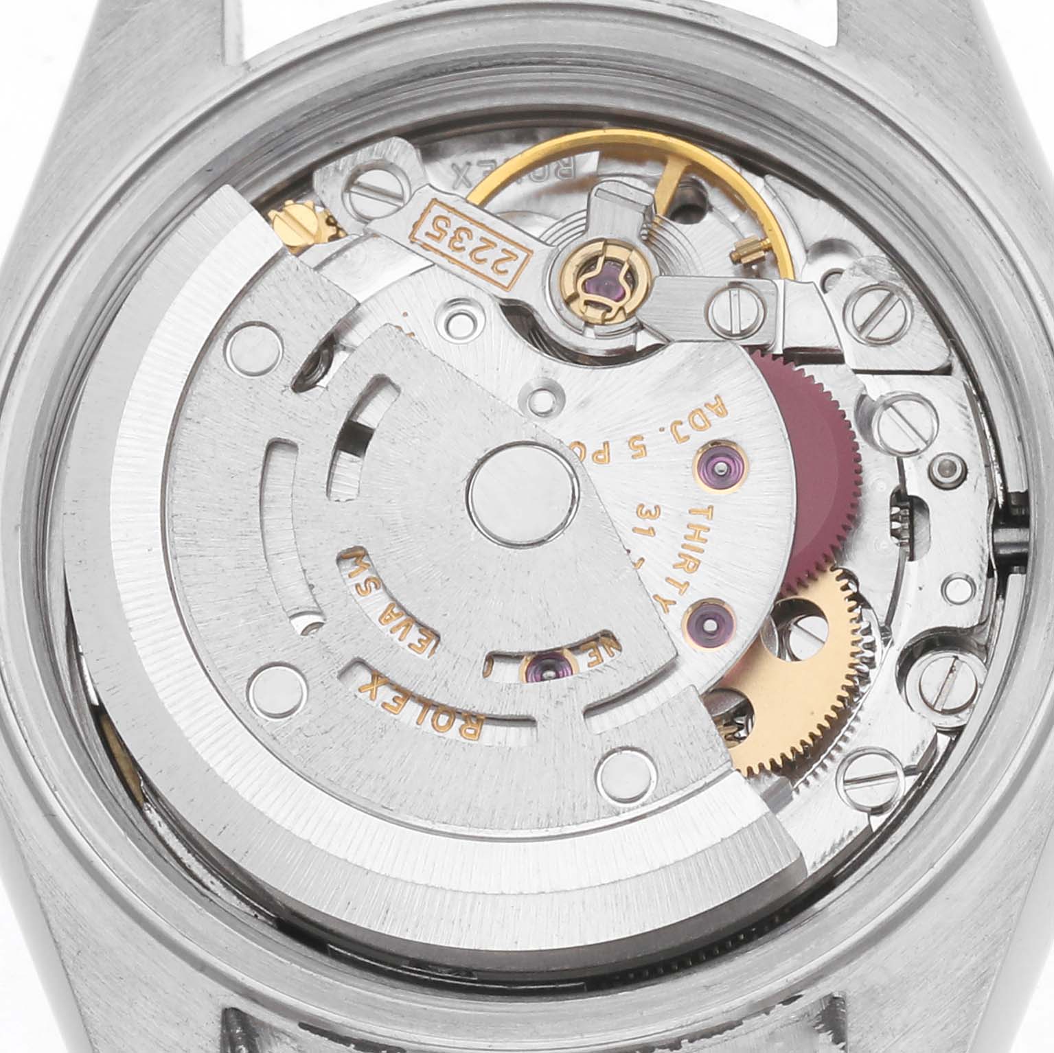 The image shows the movement of a Rolex Datejust model 79173 men's watch, specifically highlighting its internal mechanical components from the back.