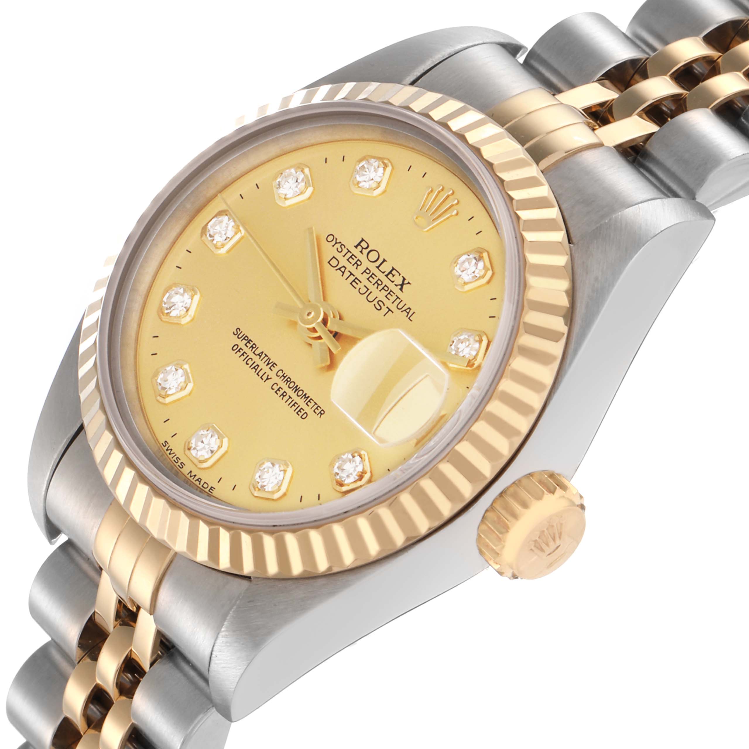 The Rolex Datejust model 69173 is shown from a side angle, displaying its gold bezel, crown, and jubilee bracelet, with a yellow dial and diamond hour markers.