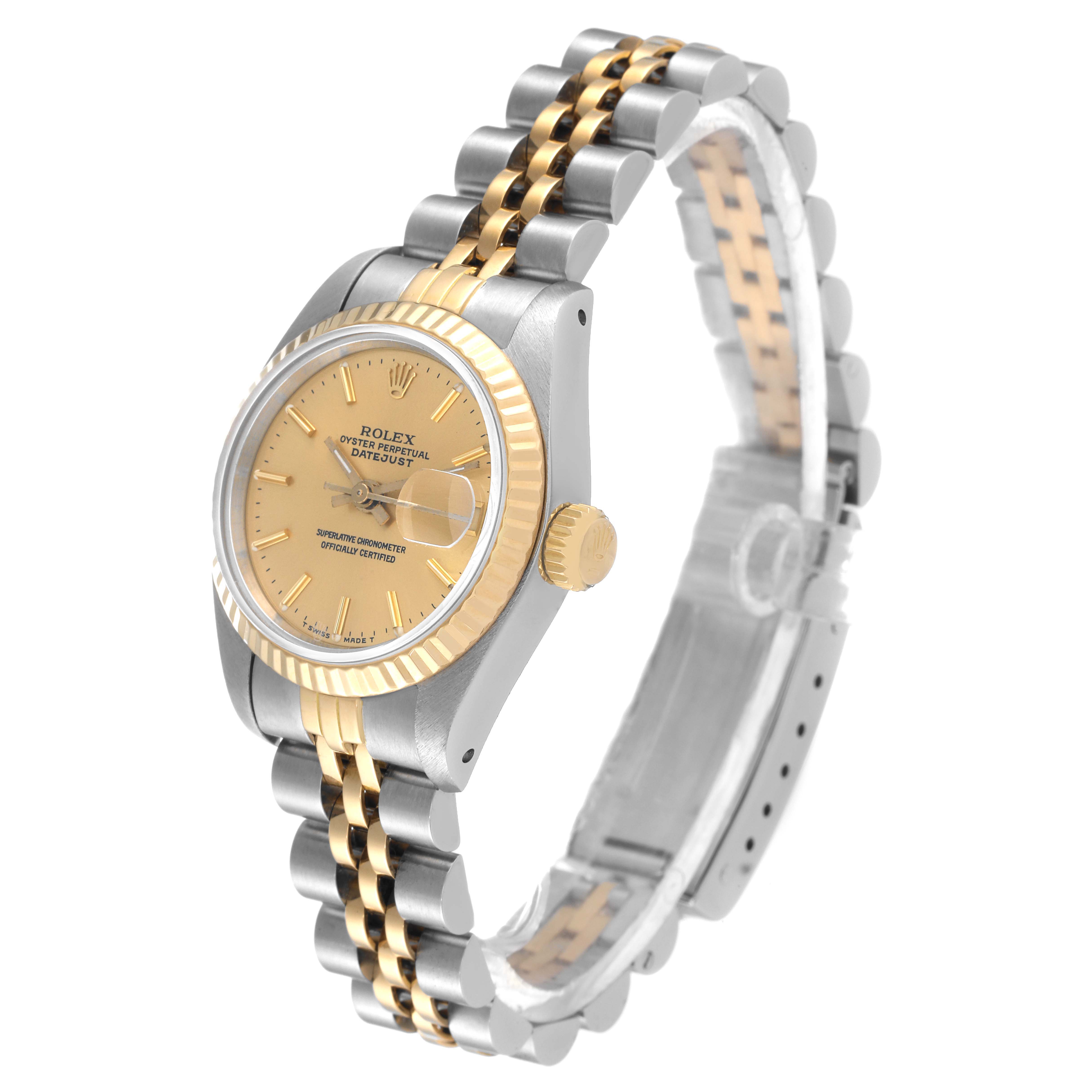 The image shows a side angle of a Rolex Datejust 69173 Women's Steel and Gold (two tone) Champagne Dial 69173 Women's Steel and Gold (two tone) Champagne Dial watch, highlighting its gold and silver bracelet, crown, and gold dial.