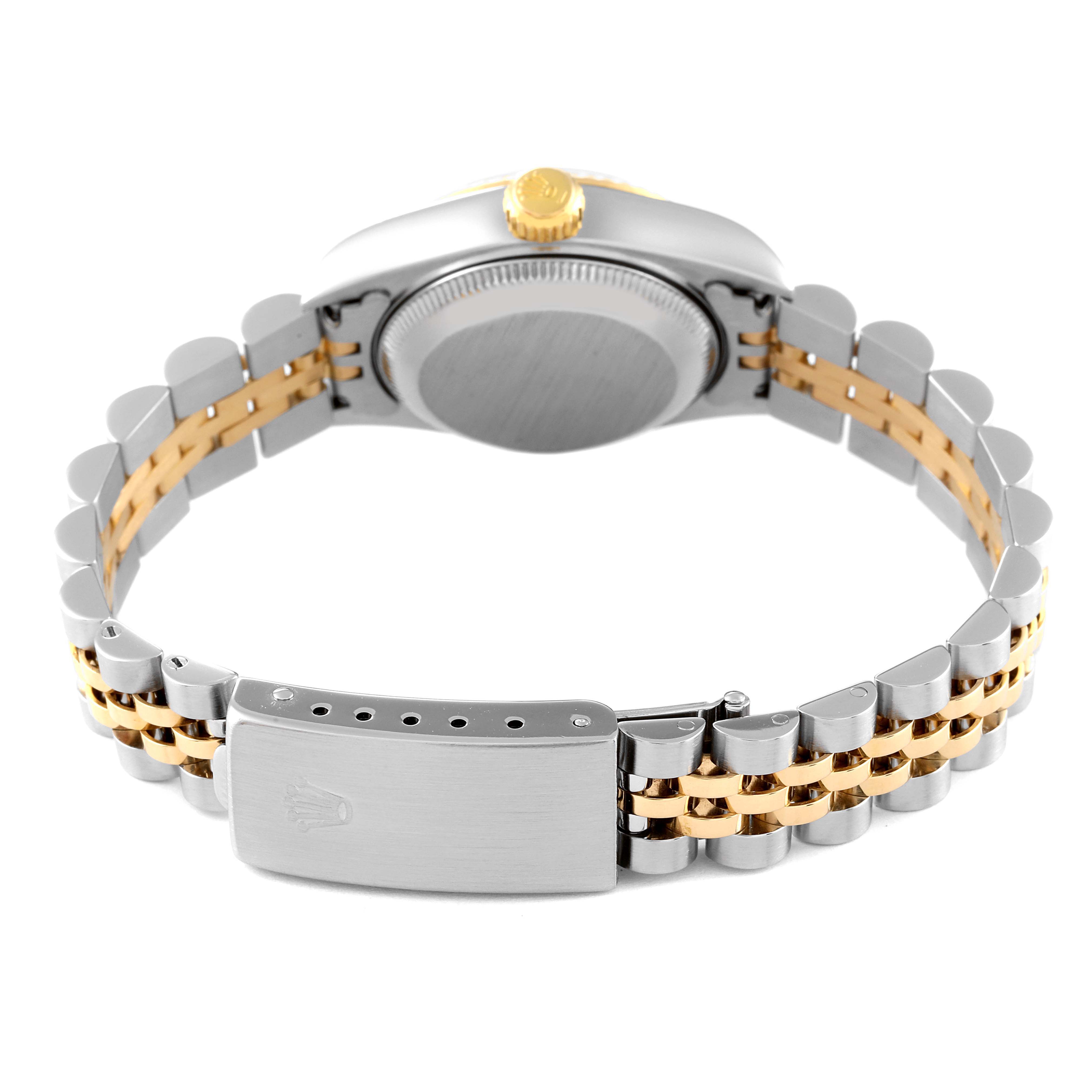 The image shows the back view of a Rolex Datejust 79173 Women's Steel and Gold (two tone) Silver Dial 79173 Women's Steel and Gold (two tone) Silver Dial watch, featuring the case back, crown, and bicolor Jubilee bracelet with a clasp.