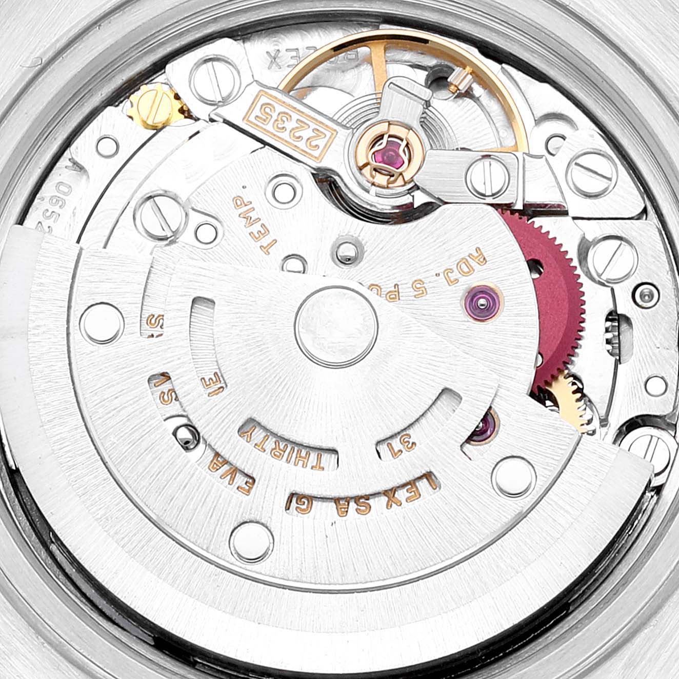 This image shows a close-up of the movement mechanism of a Rolex Datejust 79173 Women's Steel and Gold (two tone) Silver Dial 79173 Women's Steel and Gold (two tone) Silver Dial watch.