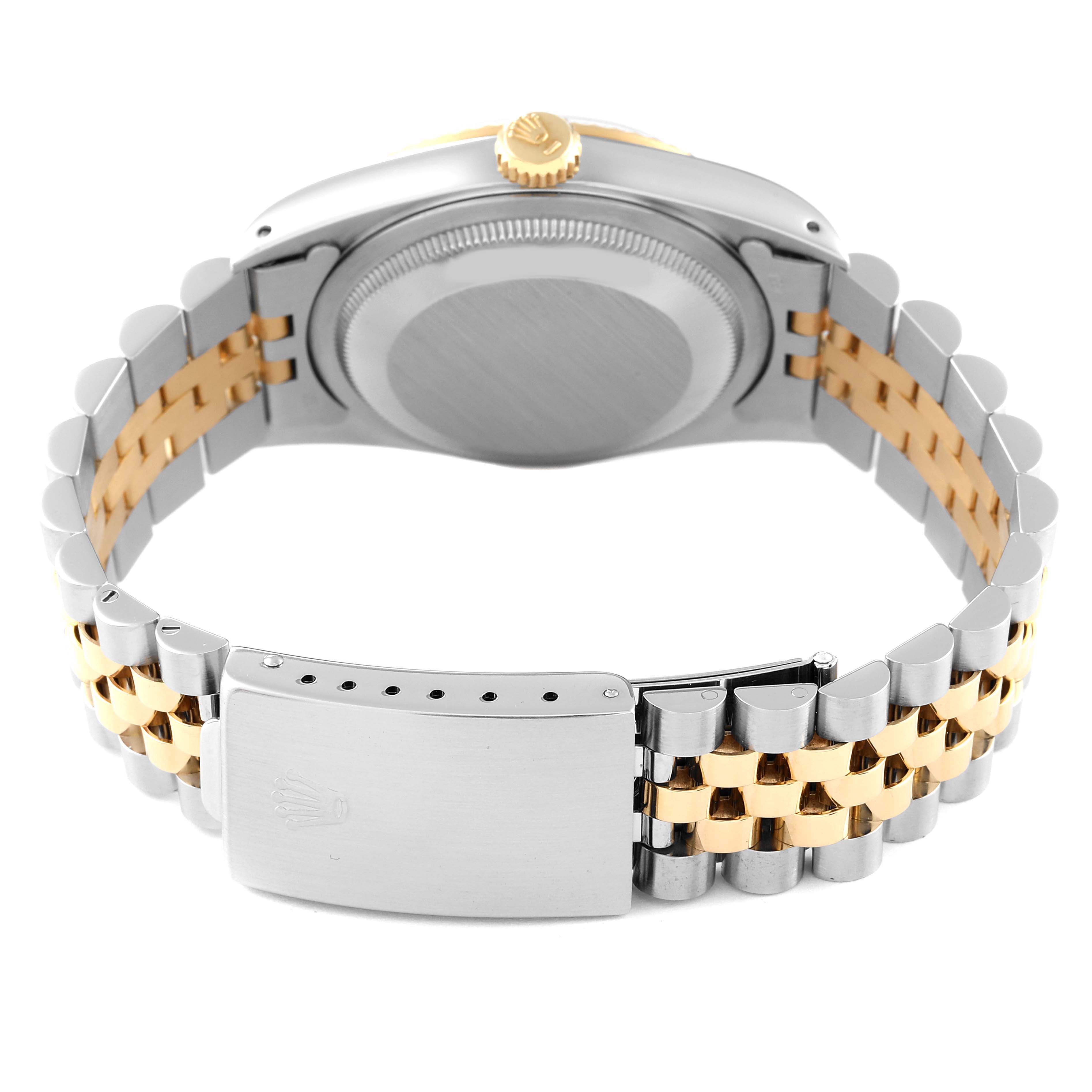 The Rolex Datejust 16233 Men's Steel and Gold (two tone) Silver Dial 16233 Men's Steel and Gold (two tone) Silver Dial watch is shown from the back, highlighting the case back, crown, and two-tone bracelet.