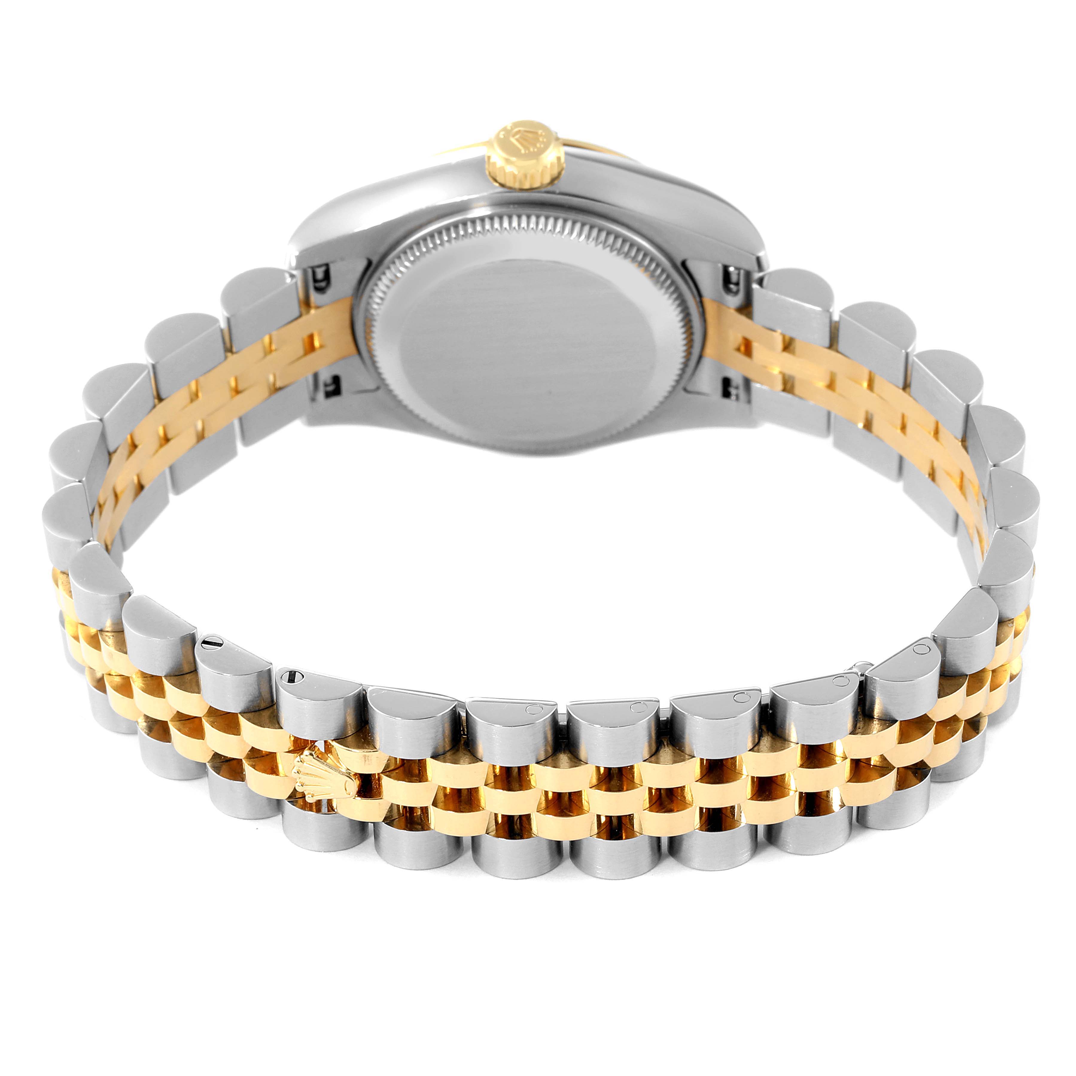 This image shows the back case and bracelet of a Rolex Datejust 179173 Women's Steel and Gold (two tone) White Dial 179173 Women's Steel and Gold (two tone) White Dial watch, featuring a two-tone metal design.