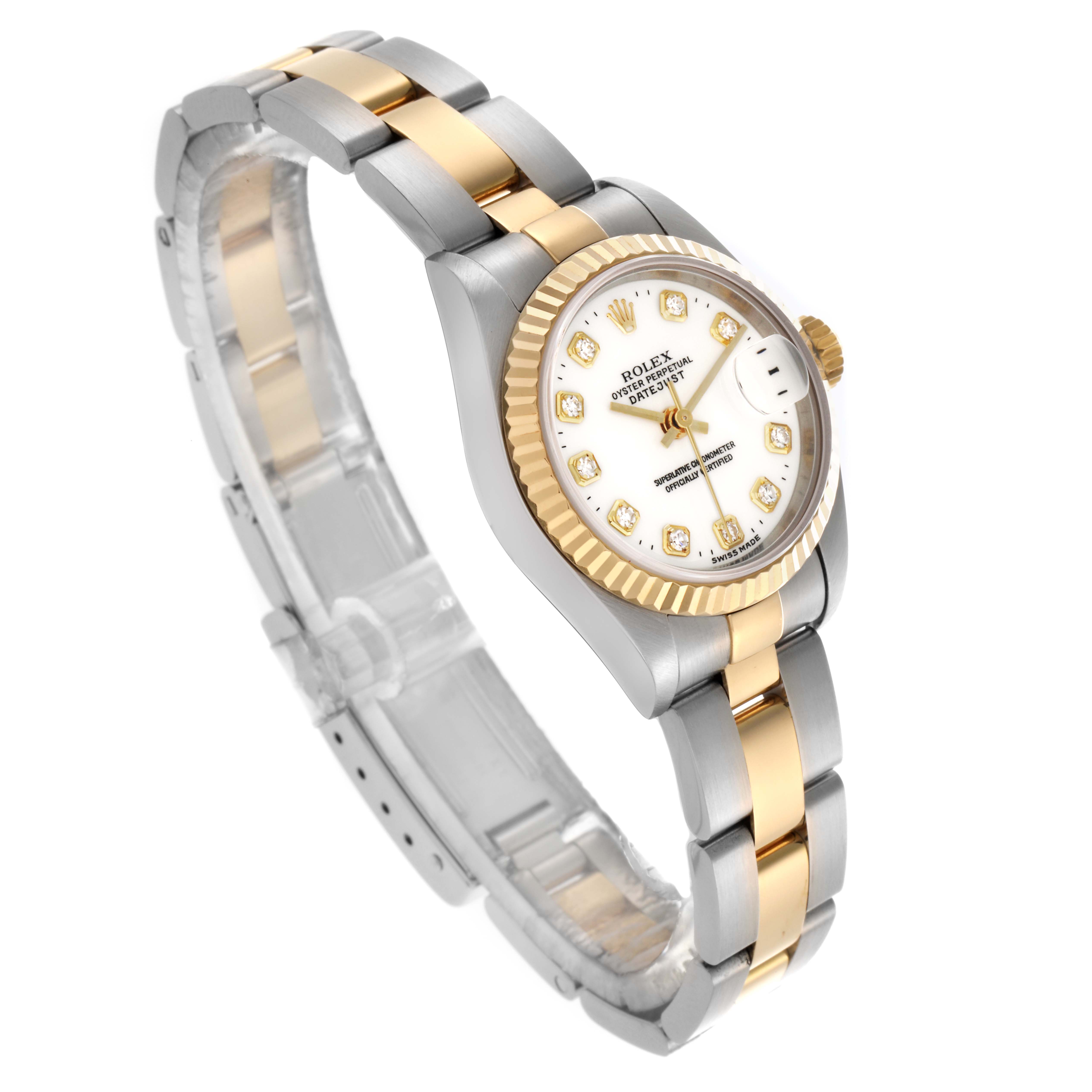The Rolex Datejust model 79173 is shown at an angled side view, highlighting its gold and silver bracelet, fluted bezel, and white dial with diamond markers.
