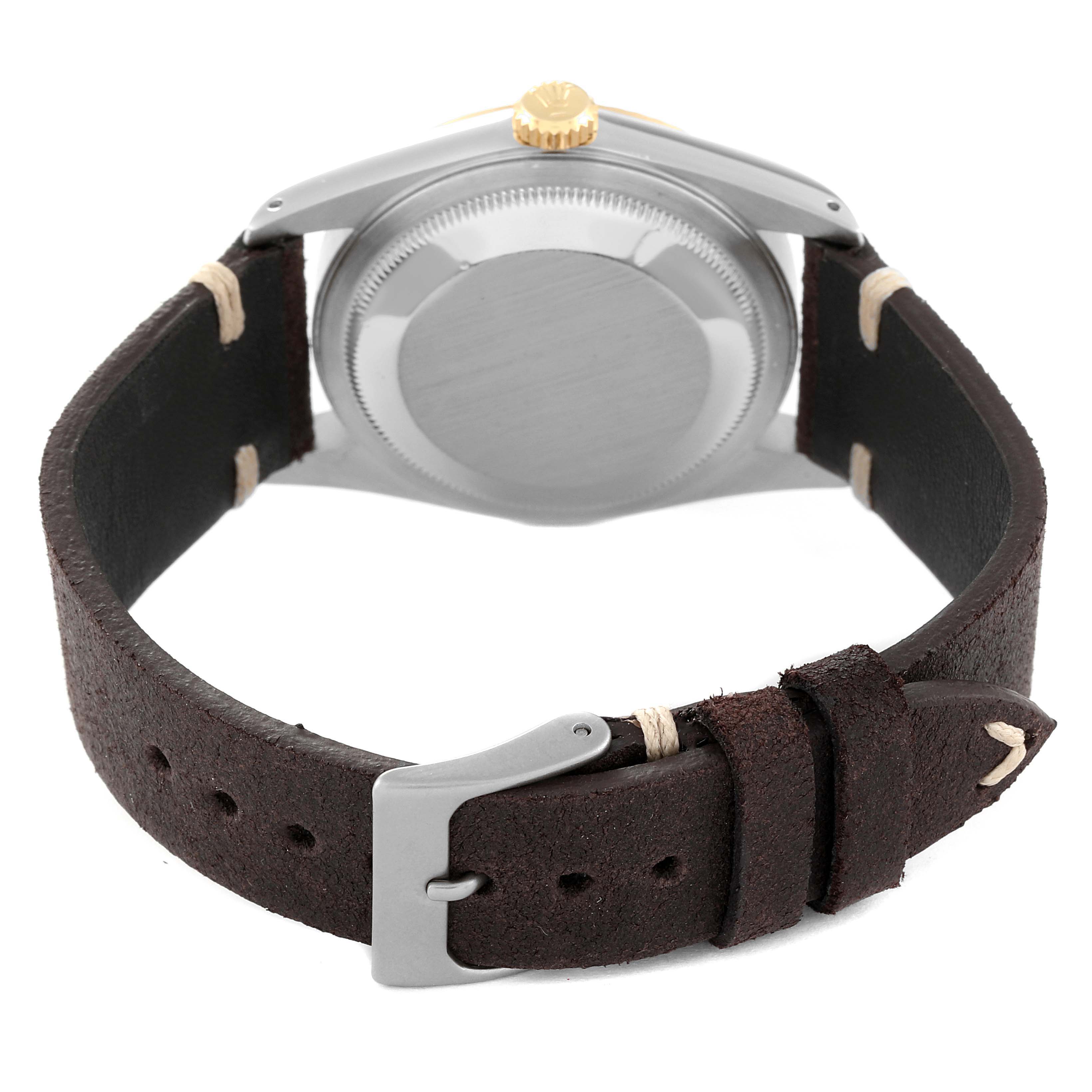 The image shows the back case, crown, and leather strap of a Rolex Vintage Collection 16233 Men's Steel and Gold (two tone) White Dial 16233 Men's Steel and Gold (two tone) White Dial model watch.