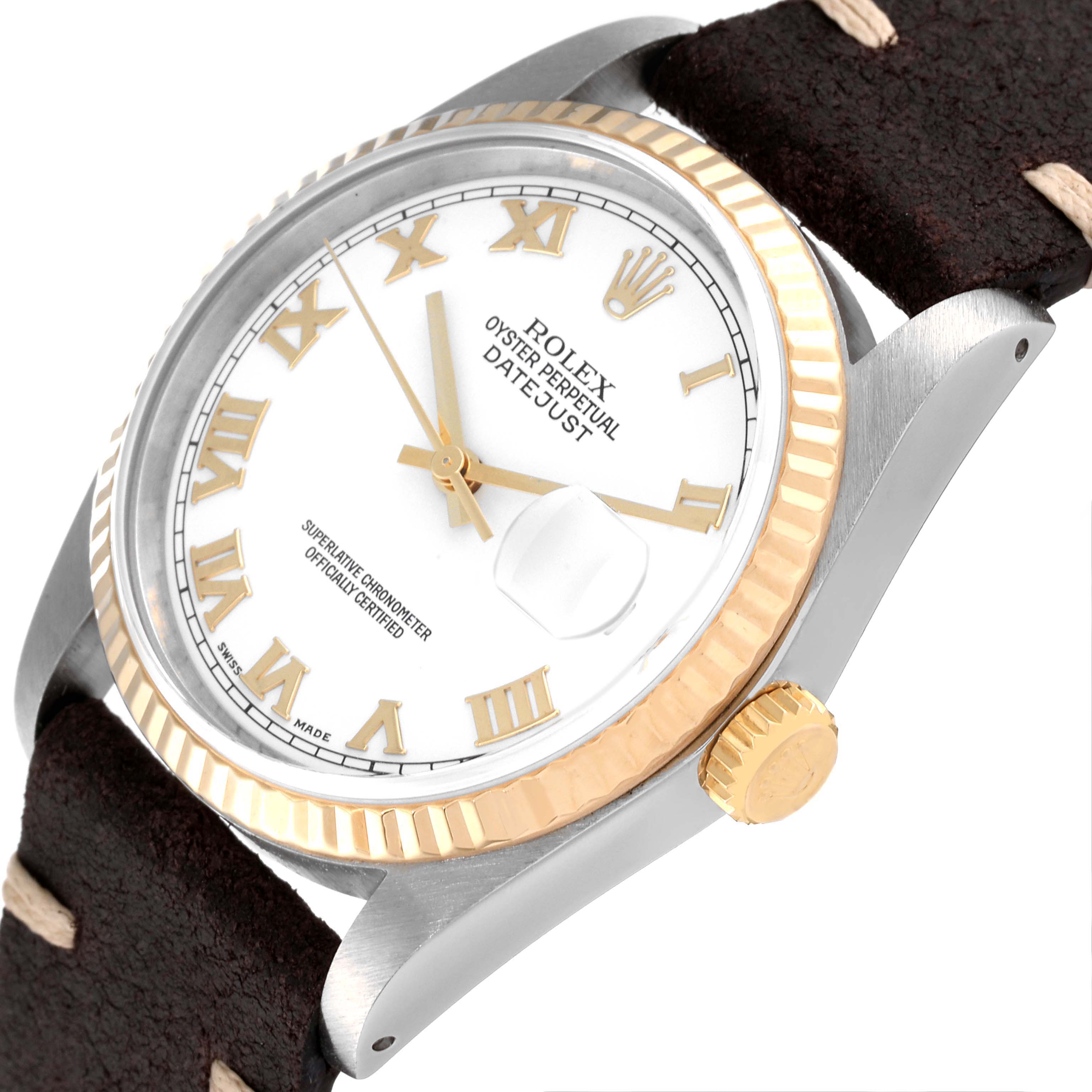 This image shows the face, crown, and part of the leather strap of a Rolex Vintage Collection 16233 Men's Steel and Gold (two tone) White Dial 16233 Men's Steel and Gold (two tone) White Dial Datejust watch.