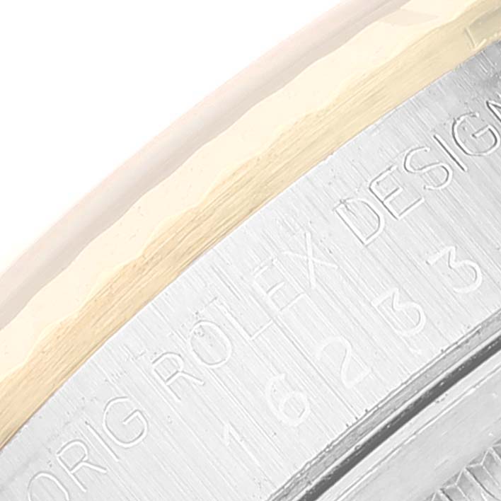 This image shows a close-up of the side engraving on a Vintage Collection Rolex watch case.