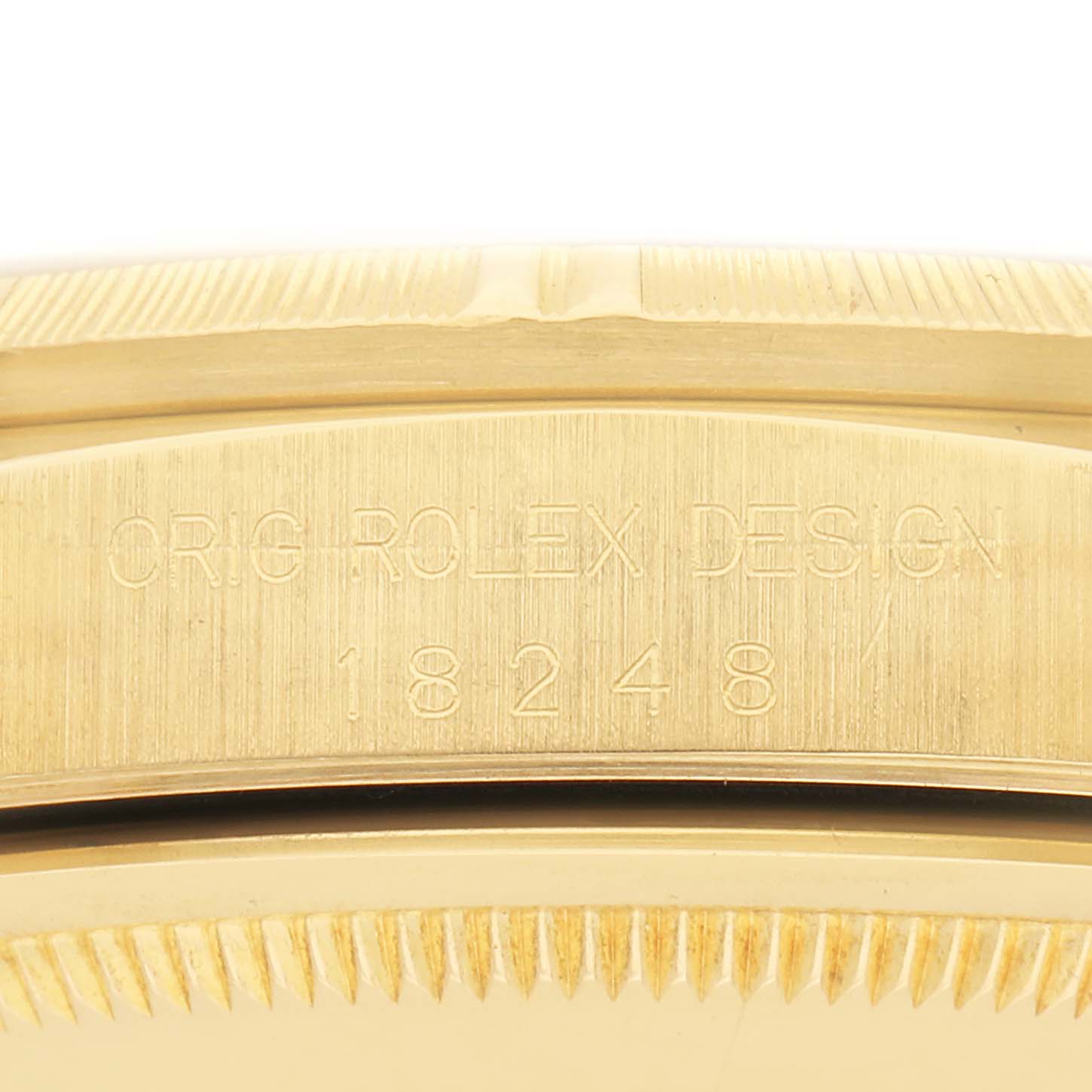 The image shows a close-up of the side engraving on the Rolex President model, model number 18248, displaying the "ORIG ROLEX DESIGN" and model number.