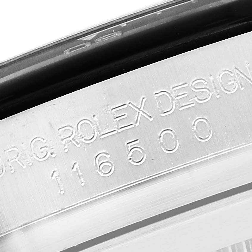 This image shows a close-up of the engraved serial number and "Rolex Design" text on the case of a Rolex Daytona 116500LN Men's Stainless Steel White Dial 116500LN Men's Stainless Steel White Dial watch.