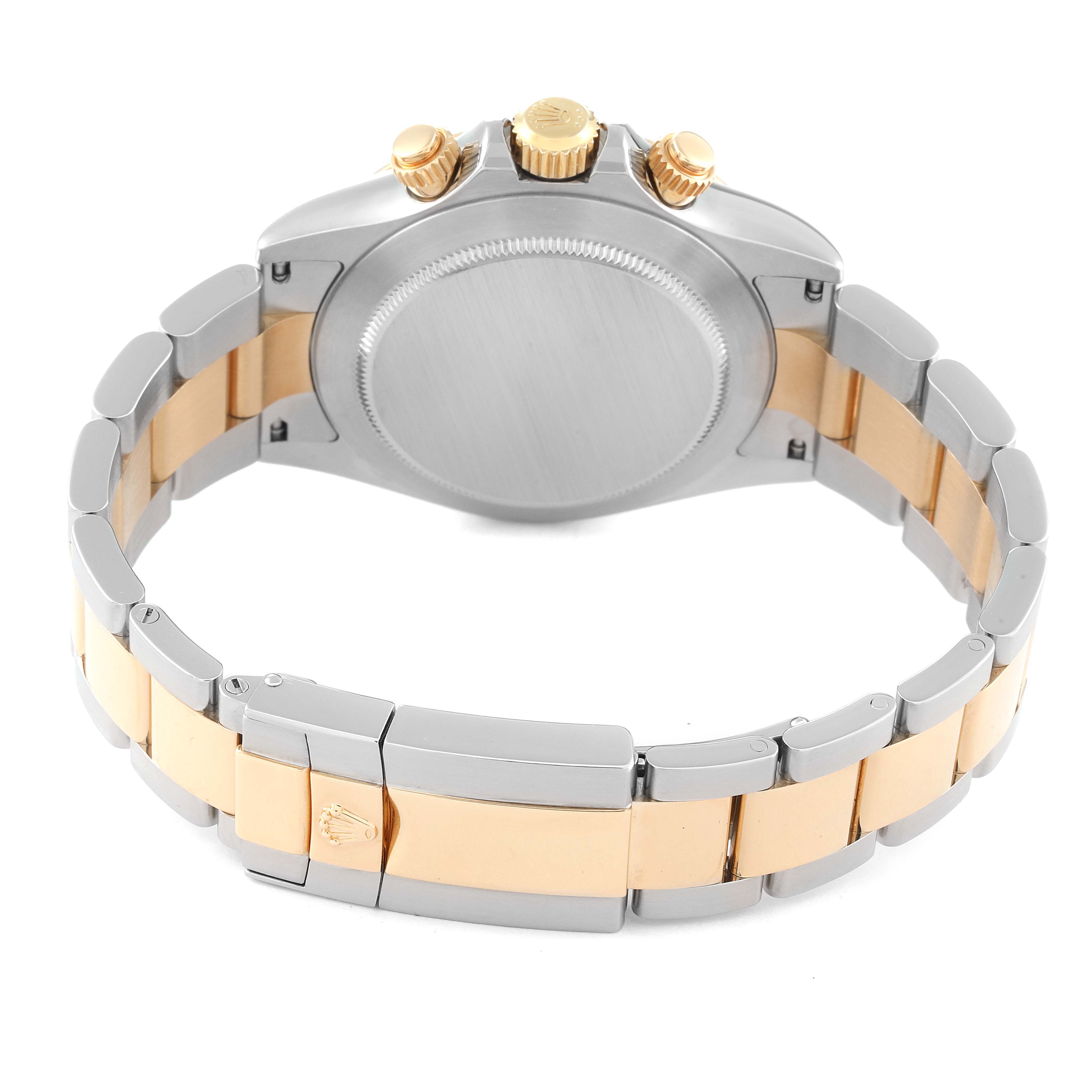 The image shows the back and bracelet of a Rolex Daytona 116523 Men's Steel and Gold (two tone) Grey Dial 116523 Men's Steel and Gold (two tone) Grey Dial watch, highlighting the case back, crown, and clasp.