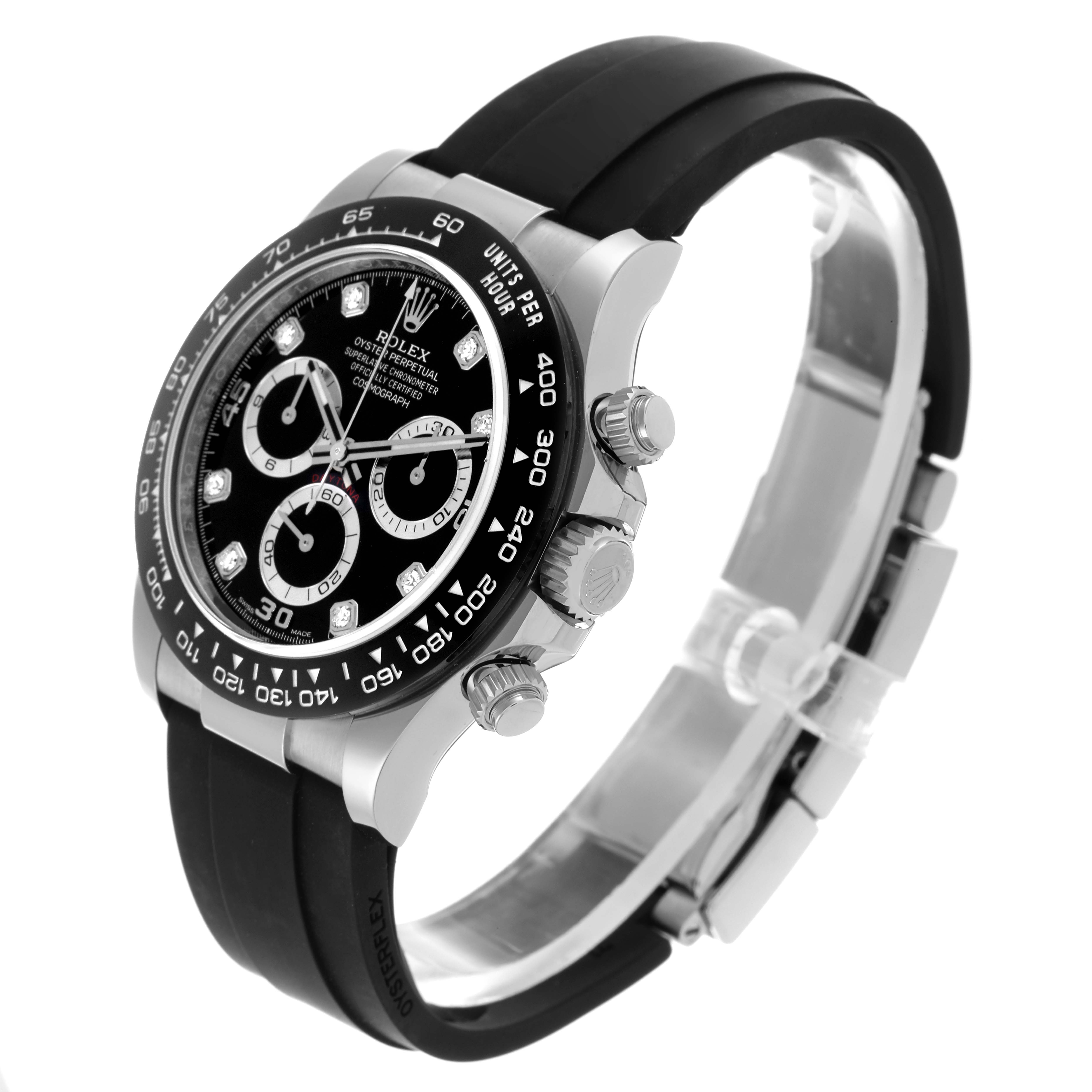 The Rolex Daytona model 116519 is shown at a three-quarter angle, displaying the bezel, dial, subdials, crown, pushers, and the Oysterflex bracelet.