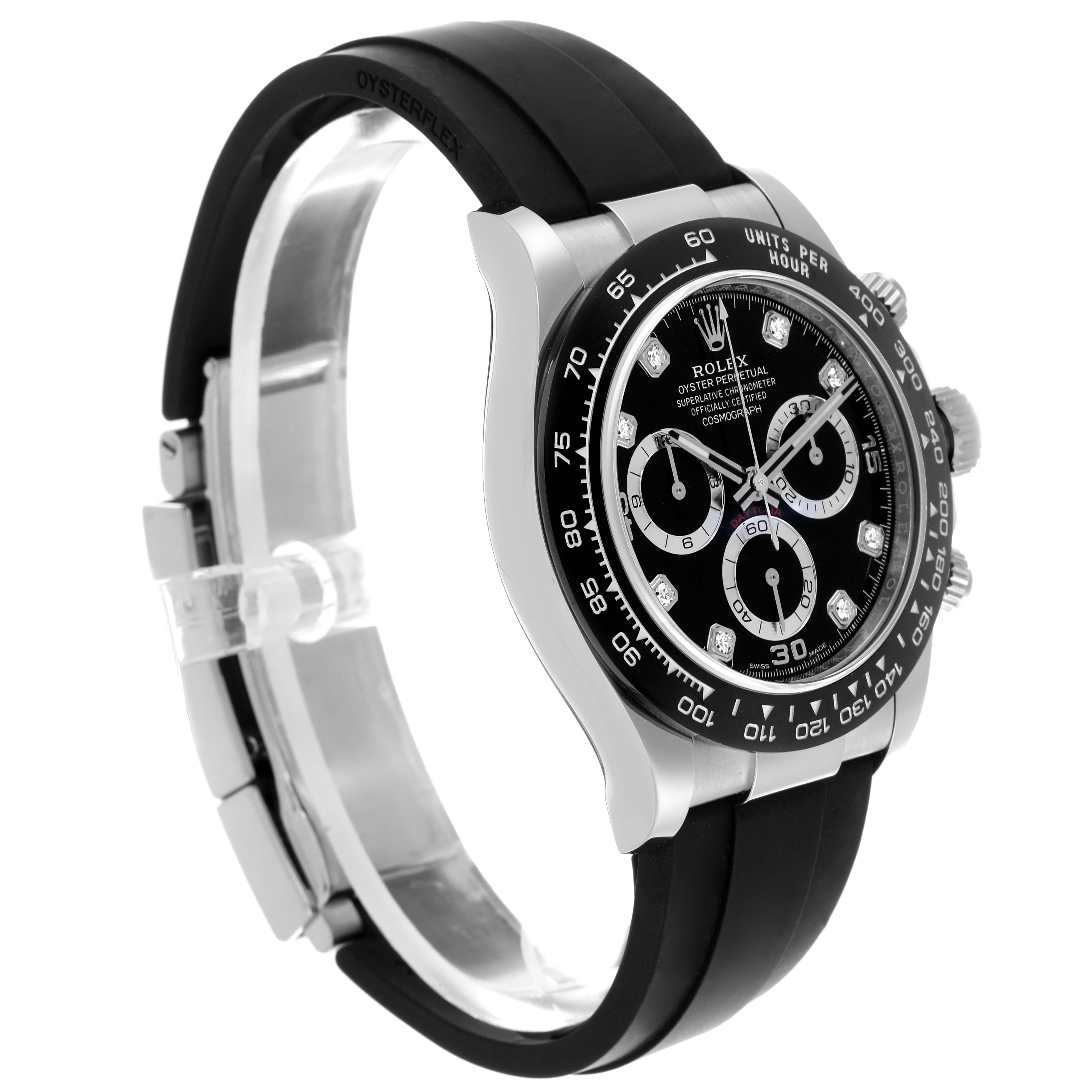 The Rolex Daytona model 116519 is shown at an angle highlighting the dial, bezel, crown, and part of the strap.