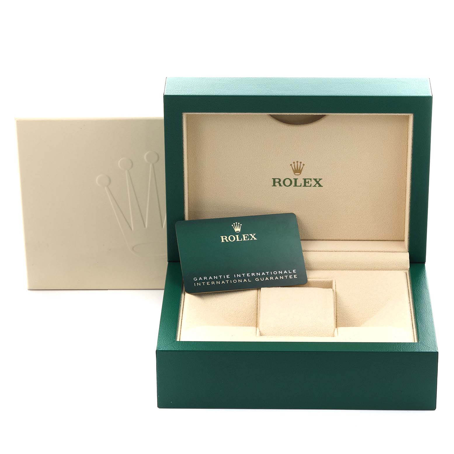 The image shows the open packaging and international guarantee card for a Rolex Daytona model, model number 116519, showcasing the box from a front angle.