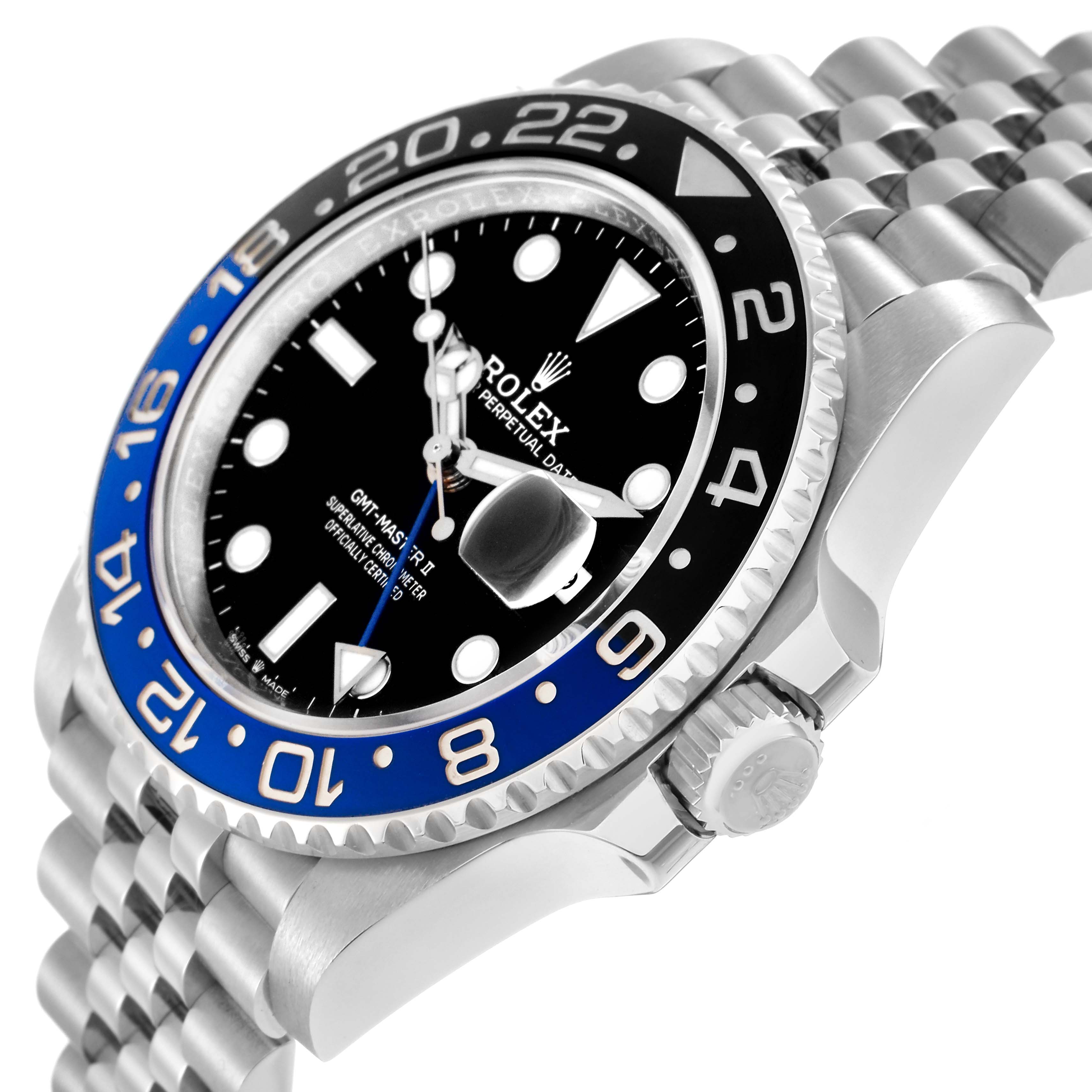 The Rolex GMT-Master model 126710 is shown at an angle highlighting the bezel, dial, crown, and part of the bracelet.