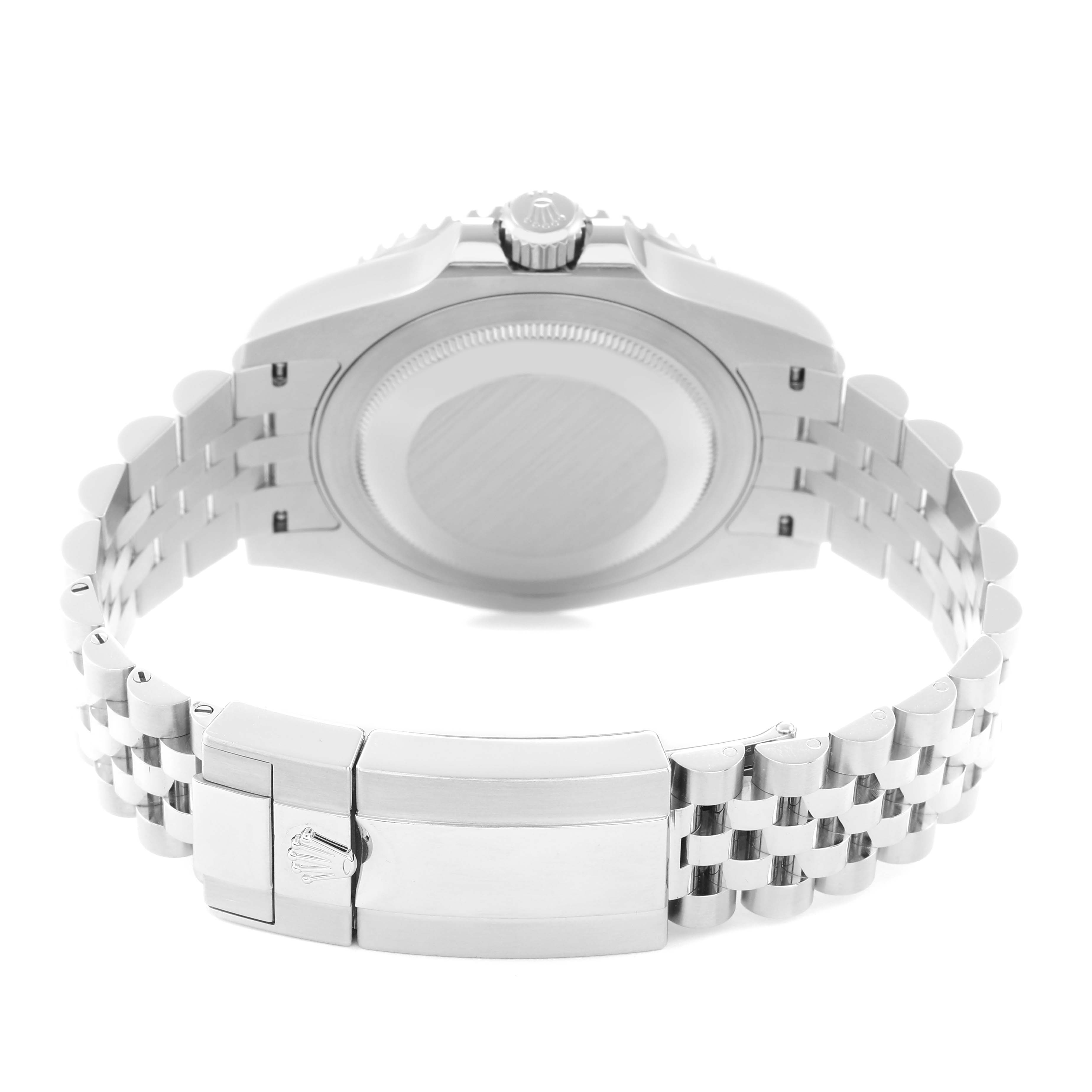 The image shows the back view of a Rolex GMT-Master model 126710, highlighting the case back, crown, and bracelet with a focus on the clasp.