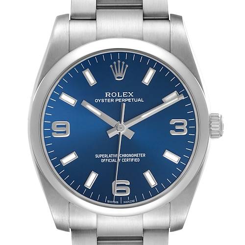 The Rolex Oyster Perpetual 114200 Men's Stainless Steel Blue Dial watch is shown from the front, highlighting the blue dial, indices, numerals, and the crown on the side.