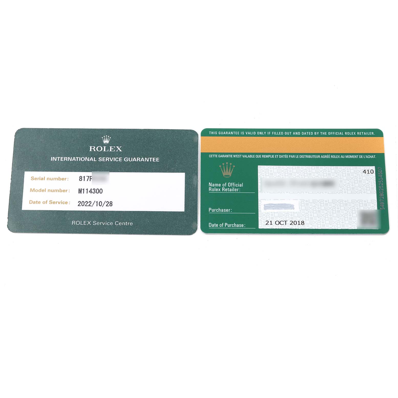 The image shows warranty and service guarantee cards for a Rolex Oyster Perpetual 114300 Men's Stainless Steel Grey Dial 114300 Men's Stainless Steel Grey Dial model M114300.