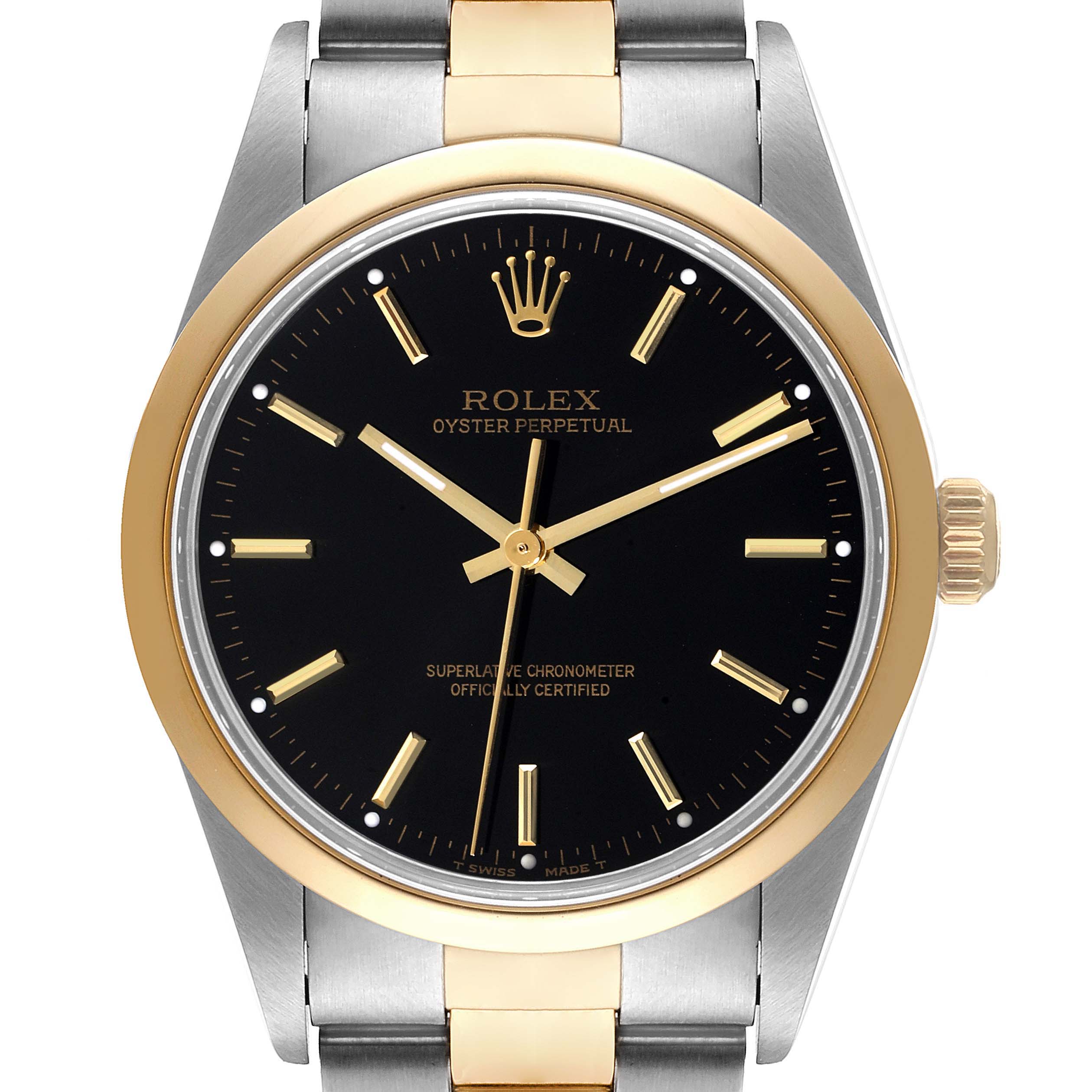 This image shows a front view of a Rolex Oyster Perpetual 14203 Men's Steel and Gold (two tone) Black Dial 14203 Men's Steel and Gold (two tone) Black Dial watch, highlighting its black dial, gold and silver bracelet, and gold bezel.