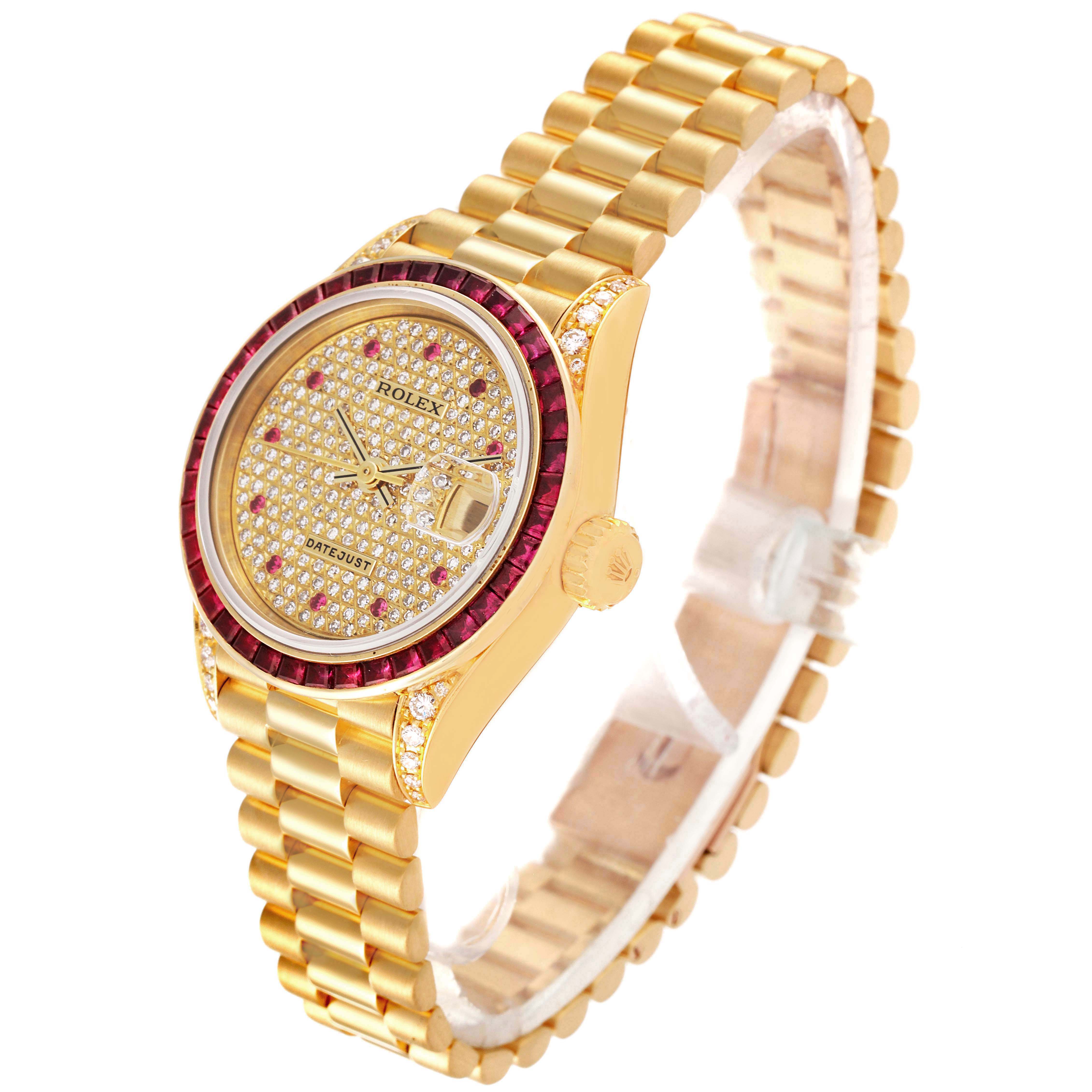 The image shows the front and side view of the Rolex President 69028 Women's Yellow Gold  69028 Women's Yellow Gold  model watch, highlighting its gold bracelet, diamond-encrusted dial, and ruby bezel.