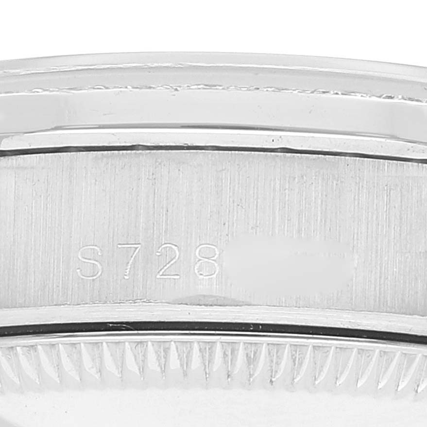 This close-up image shows the serial number engraved on the side of the President model by Rolex.