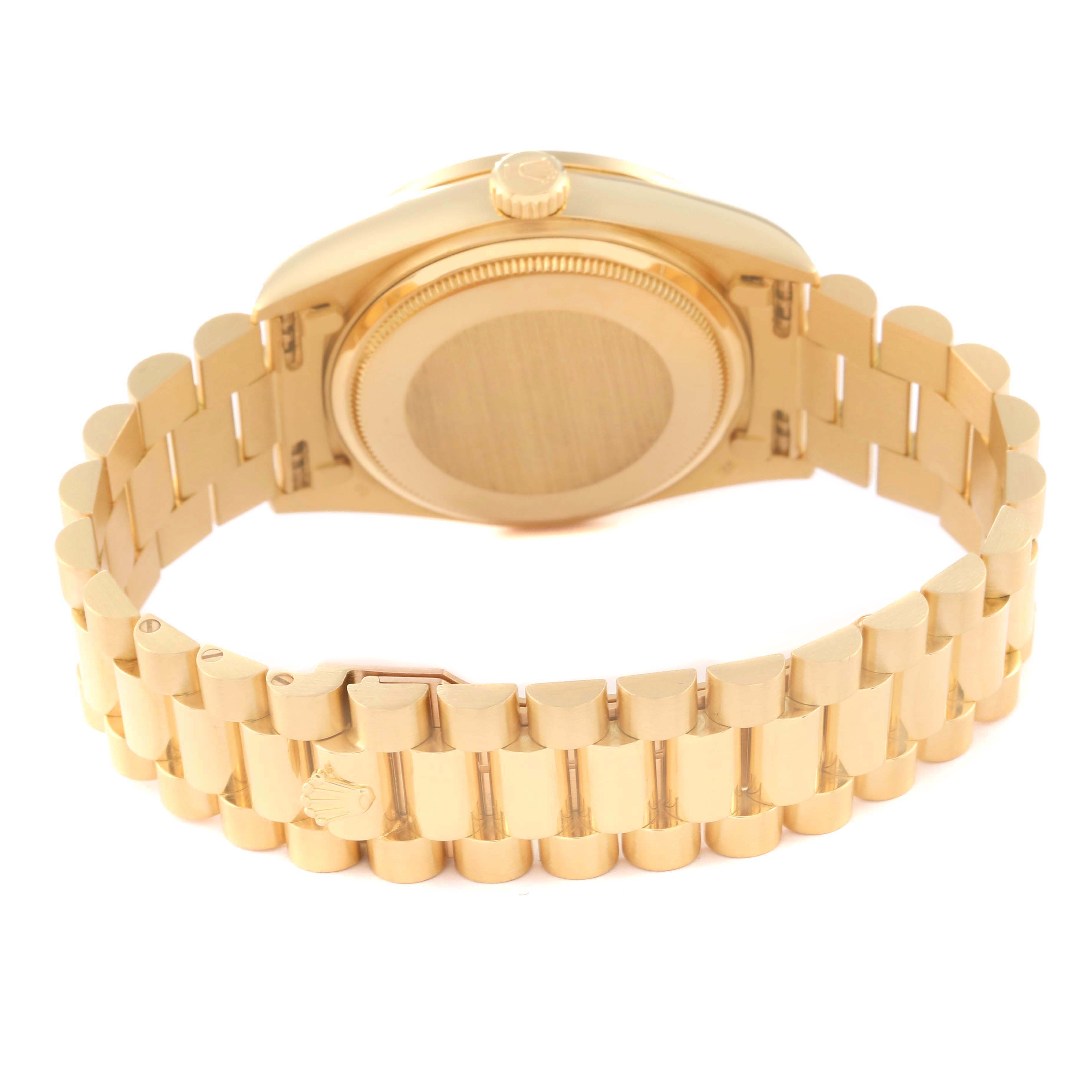 The image shows the backside and bracelet of a Rolex President 18138 Men's Yellow Gold Champagne Dial 18138 Men's Yellow Gold Champagne Dial model watch, highlighting its clasp and case back.