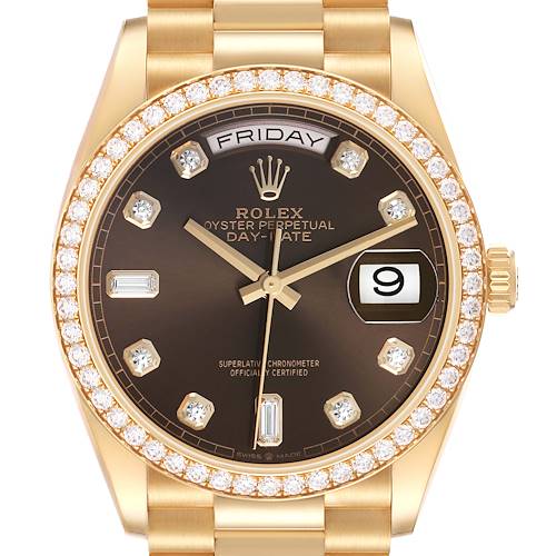 The image shows a frontal view of a Rolex President 128348 Men's Yellow Gold Brown Dial model, highlighting the dial, bezel, and part of the bracelet.