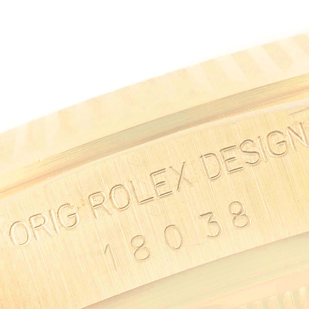 This close-up image shows the caseback engraving of a Rolex President 18038 Men's Yellow Gold Champagne Dial 18038 Men's Yellow Gold Champagne Dial model watch, highlighting the model number.