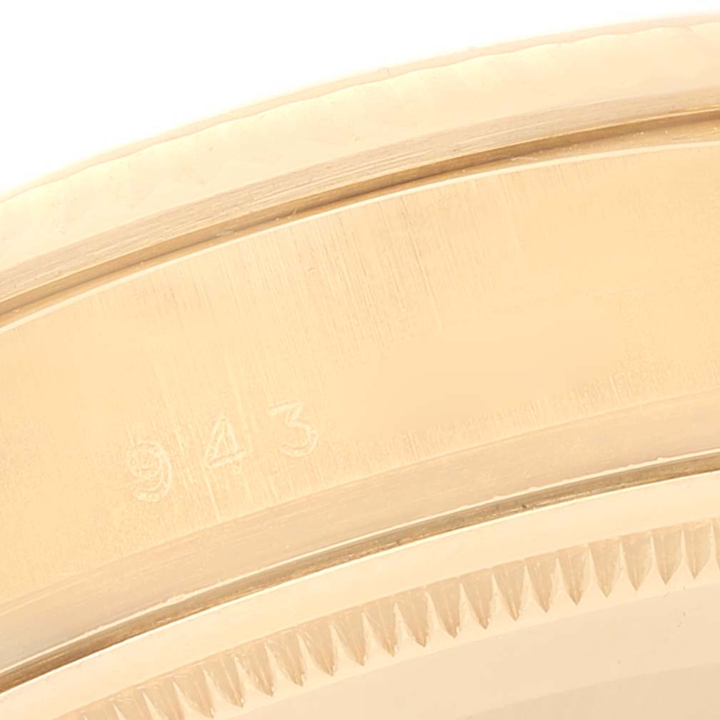 This image shows a close-up of the bezel and edge of the case of a Rolex President 18038 Men's Yellow Gold Champagne Dial 18038 Men's Yellow Gold Champagne Dial model watch.