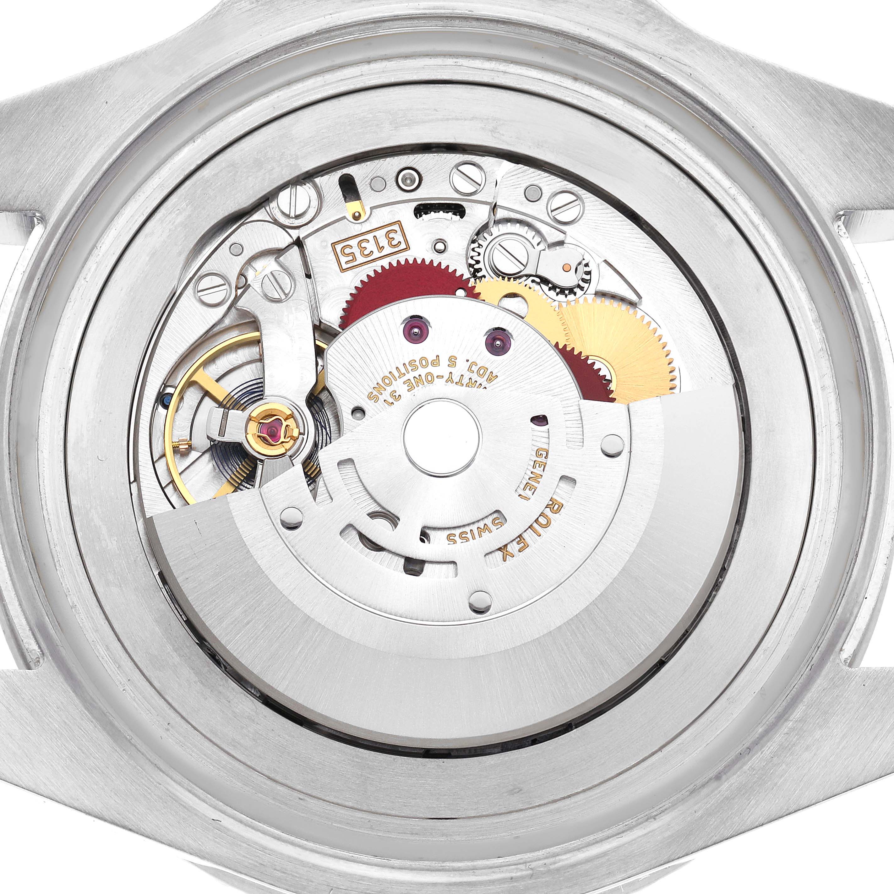 The image shows the movement of a Rolex Sea-Dweller model 116660 men's watch from a rear angle, highlighting its intricate mechanical components.