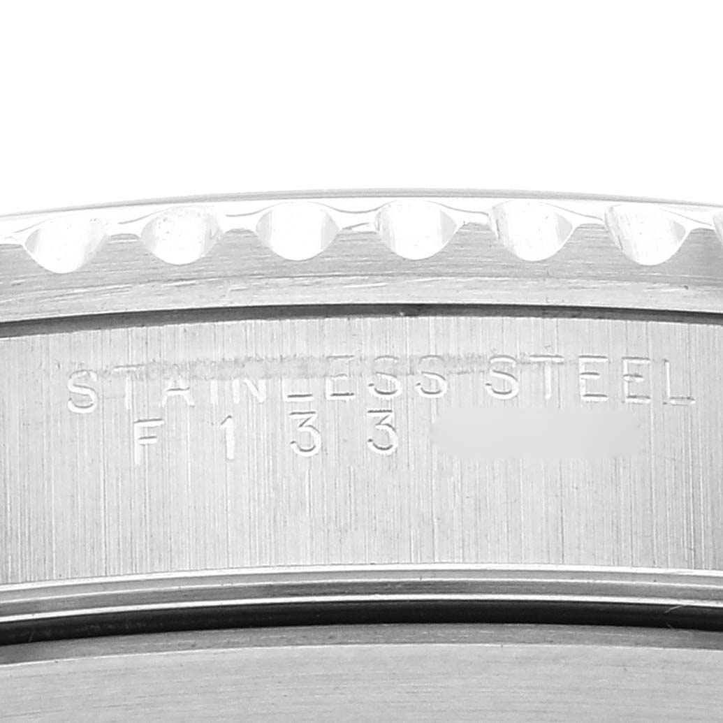 This close-up angle displays the side engravings on the case of the Rolex Submariner 14060 Men's Stainless Steel Black Dial 14060 Men's Stainless Steel Black Dial watch.